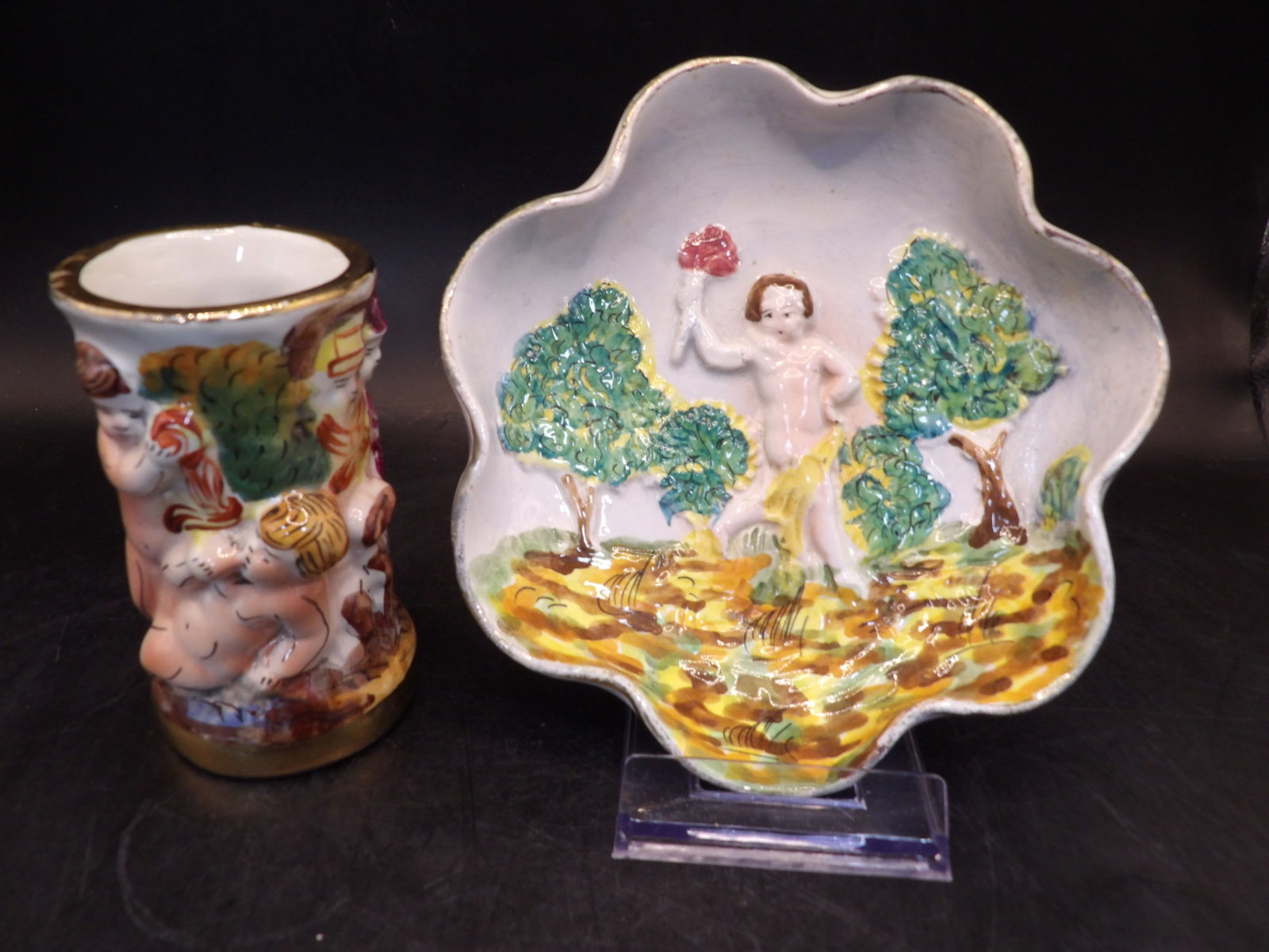 lot of 2 Italian Capodimonte porcelain cherub small vase and scalloped dish: Mini vase is 3.6 inches height. Scalloped dish is 5.3 inches diameter with hanging holes on the bottom rim.
