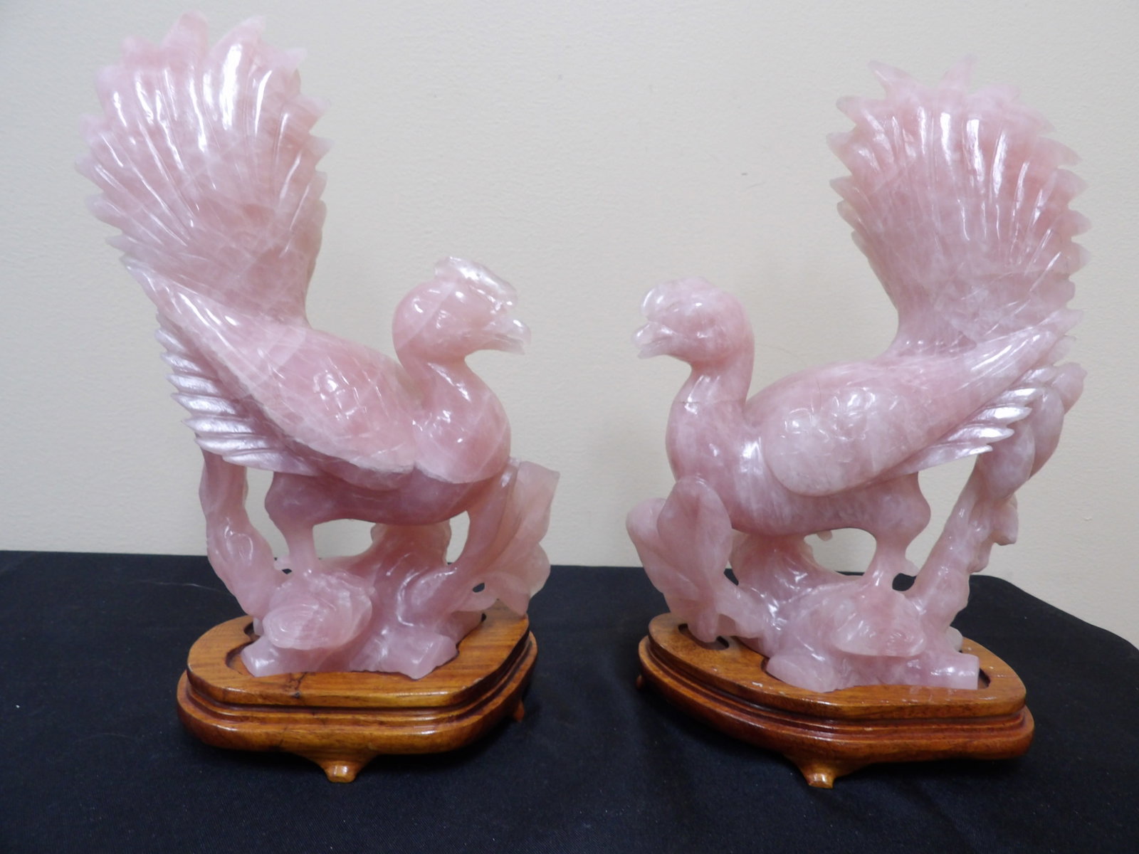pair of Chinese carved rose quartz phoenix statues on custom wood bases: 10.6 inches height including wooden base.
