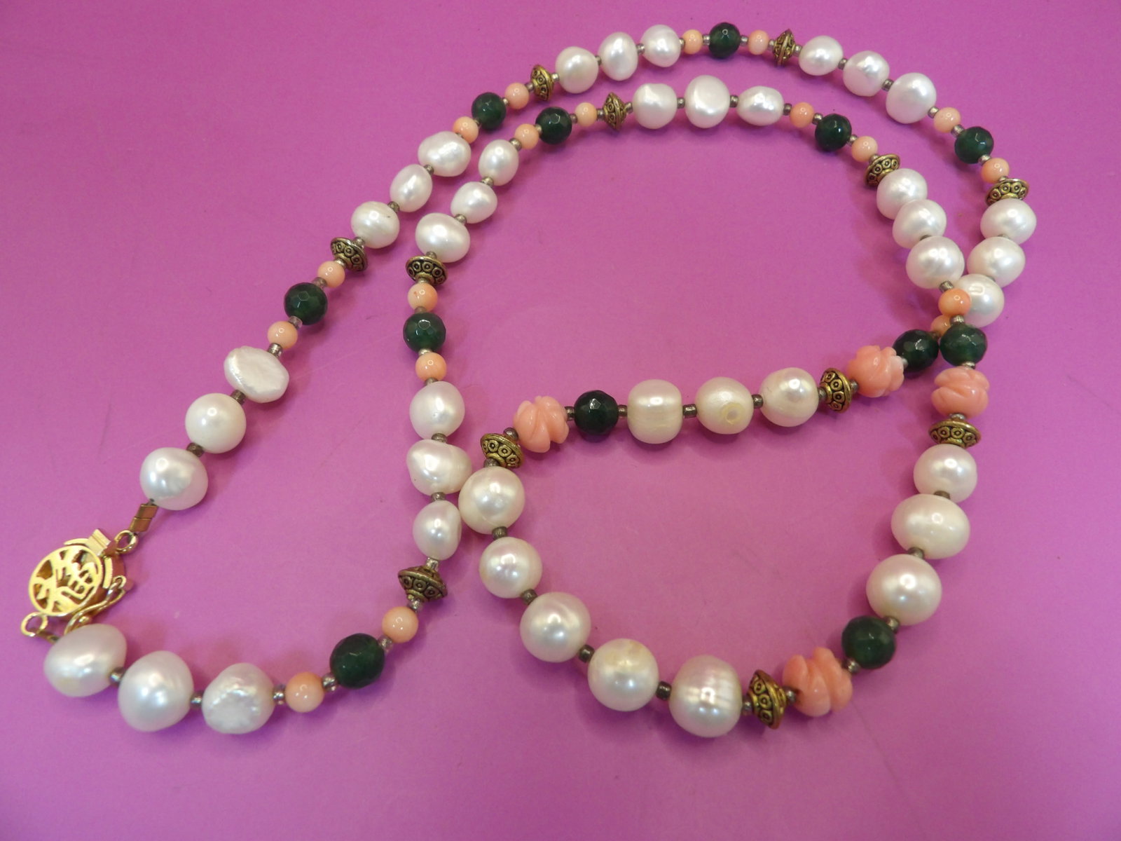 pearl angel skin coral and green bead long necklace with Chinese character on clasp: 24 inches long.