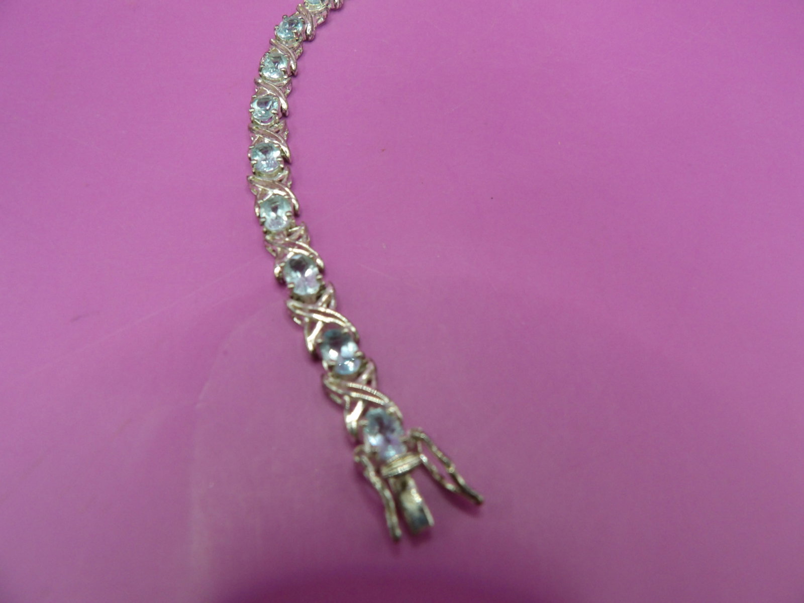 marked 925 sterling silver aquamarine gem stone X links tennis bracelet: 7.25 inches length. We will inhouse ship items to you very affordable and efficient. Select self-arrange shipping.
