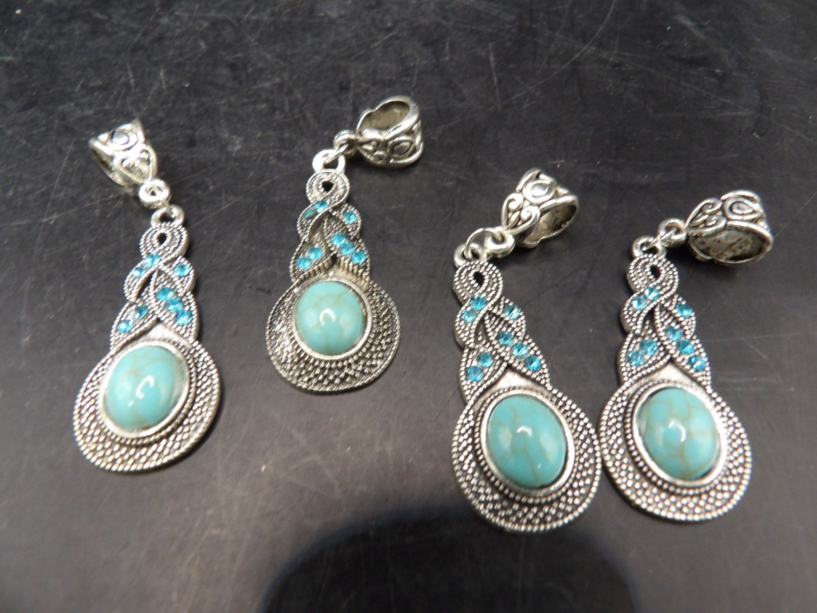 lot of 4 pendants: 2 inches height including bail. We will inhouse ship items to you very affordable and efficient. Select self-arrange shipping.