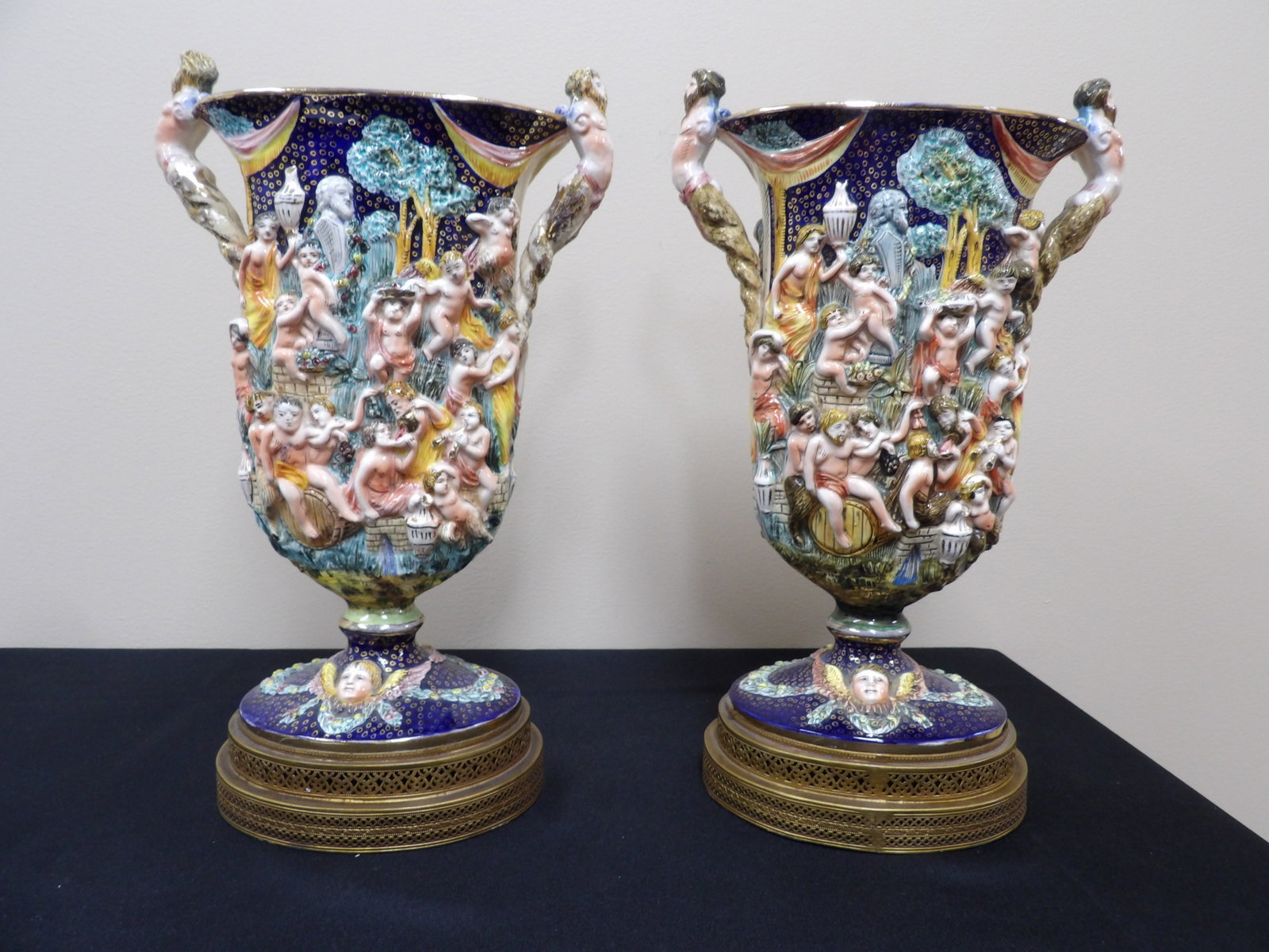 antique ornate pair of Italian Capodimonte porcelain vase with figural decoration and brass bases: Vases are adhered to brass bases. 13.8 inches height including brass base. We will inhouse ship items to you very affordable and efficient. Select self-arrange shipping.