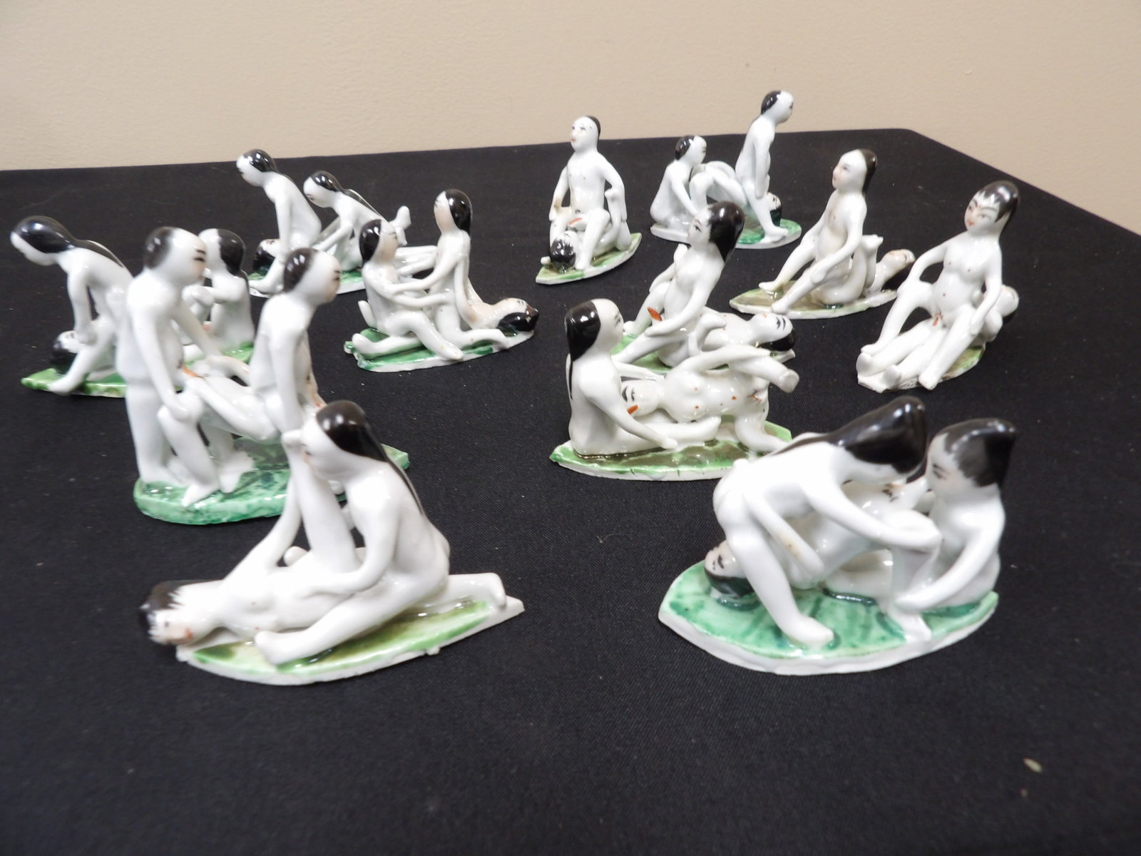 rare lot of 12 antique Chinese erotic porcelain figurines on green leaf bases: The longest one is 3.5 inches length. Lot of 12. We will inhouse ship items to you very affordable and efficient. Select self-arrange shipping.