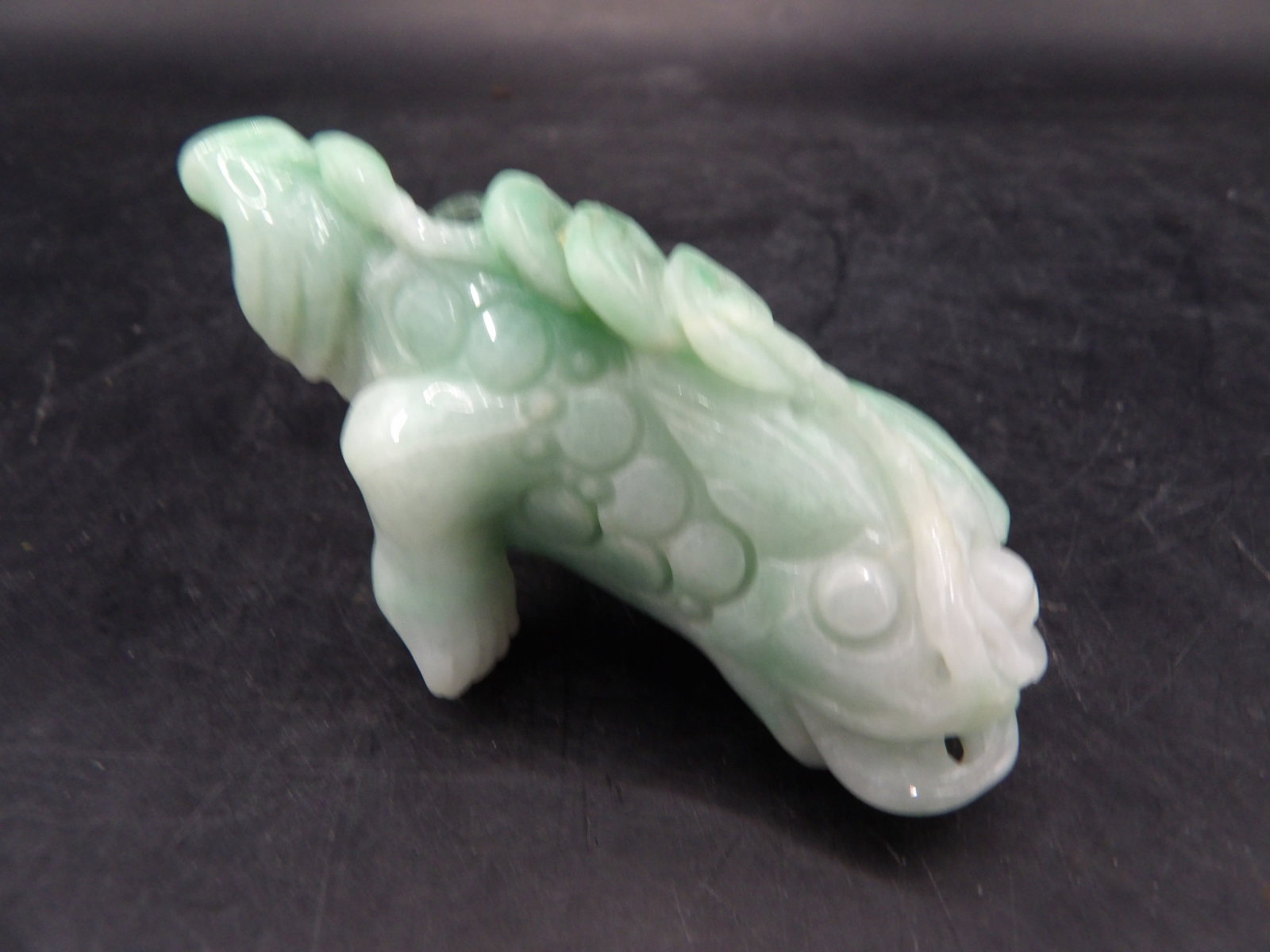 Chinese jadeite jade fine toad carving: 2.7 inches length. 83 grams. We will inhouse ship items to you very affordable and efficient. Select self-arrange shipping.