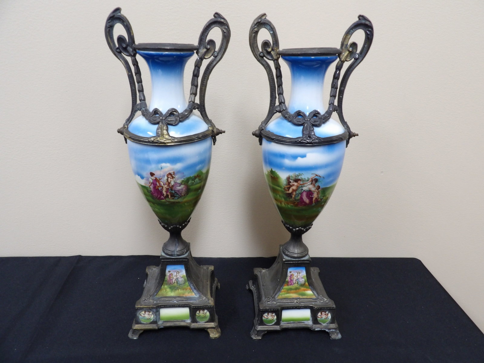Antique pair of hand painted French porcelain and mixed metal amphora vases: 15.5 inches height. We will inhouse ship items to you very affordable and efficient. Select self-arrange shipping.