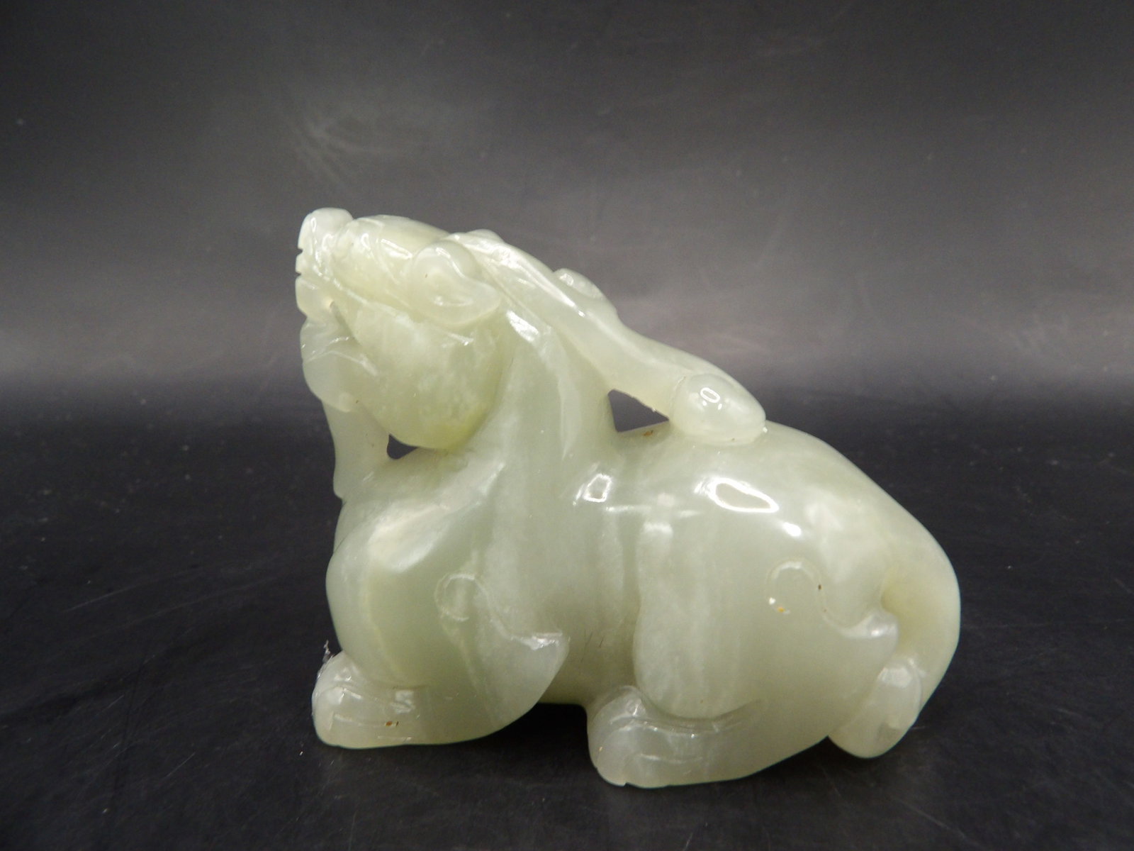 Chinese nephrite jade beast carving: 3 inches length. 153 grams. We will inhouse ship items to you very affordable and efficient. Select self-arrange shipping.