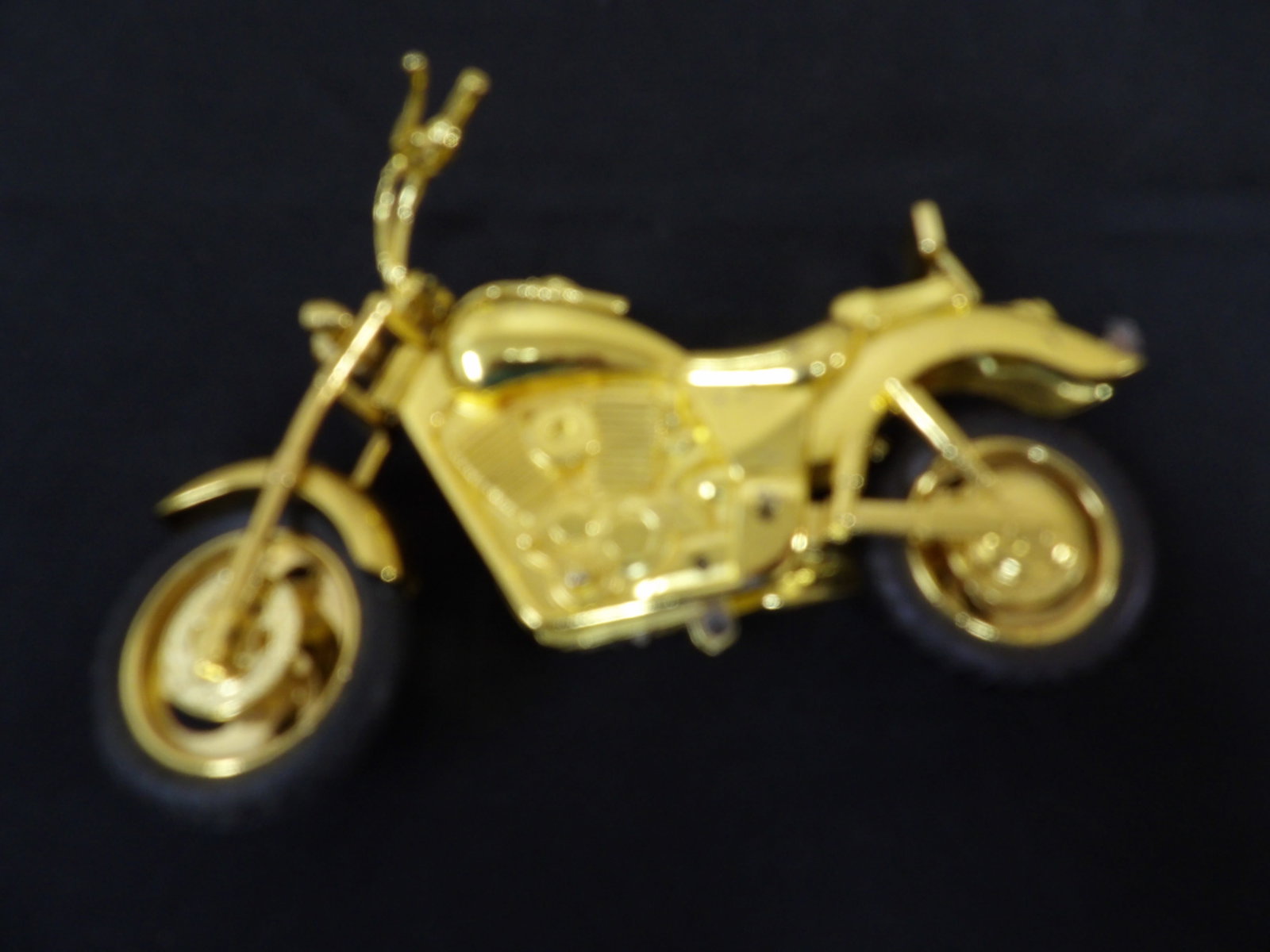 gold color motorcycle-shaped lighter working condition: 7 inches length.