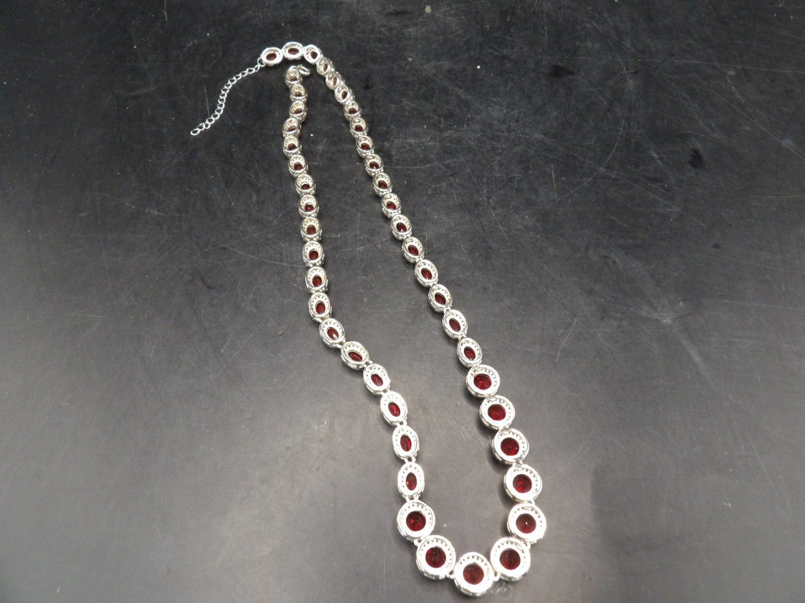 elegant simulated ruby tennis necklace with simulated ruby surrounded by CZ - 3