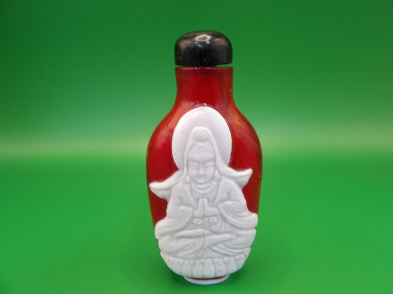 rare Chinese antique glass overlay snuff bottle with Kwan Yin motif and prunus blossom: 2.9 inches height.