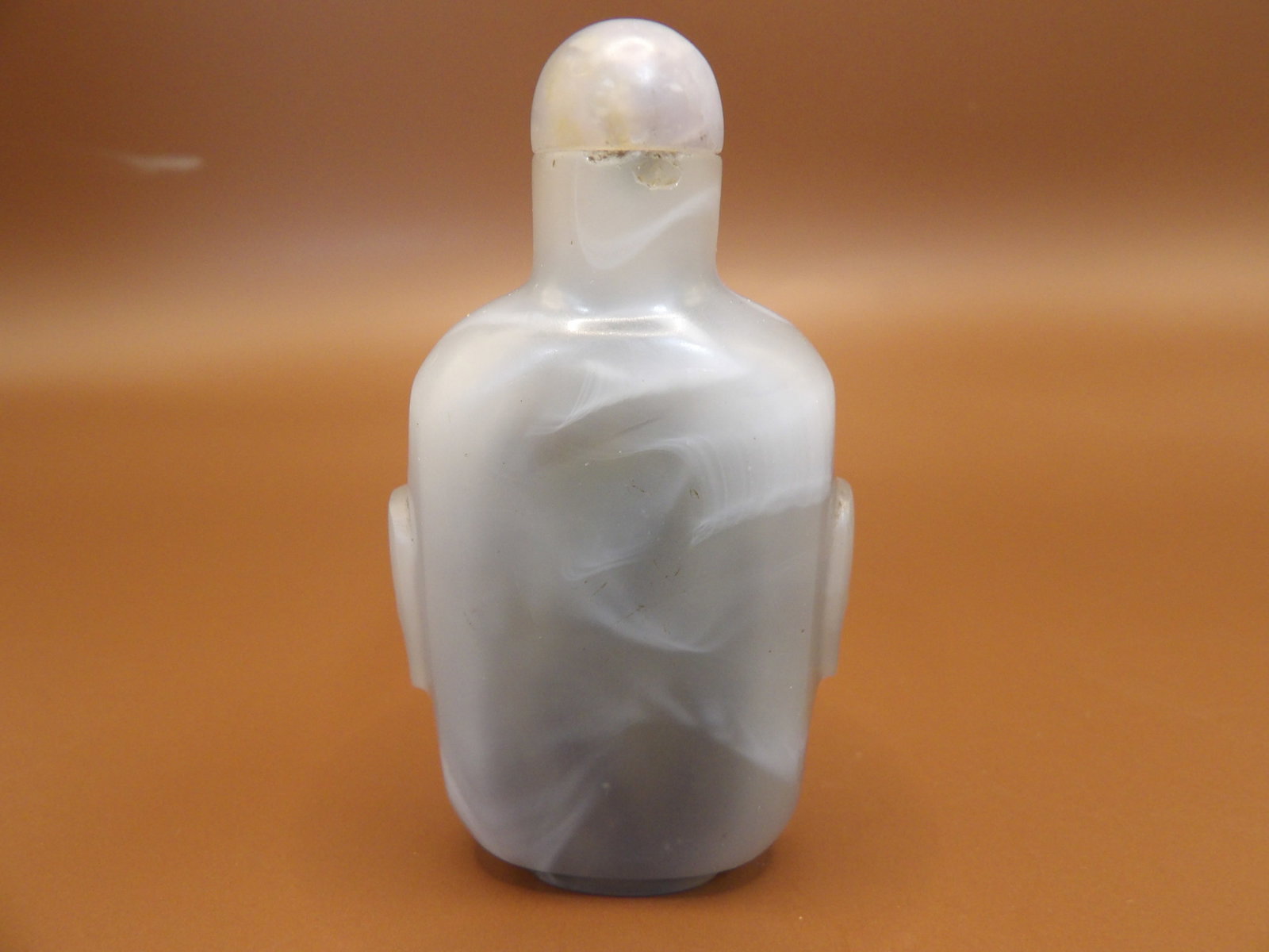 Chinese carved agate snuff bottle with mask handles: 2.7 inches height.