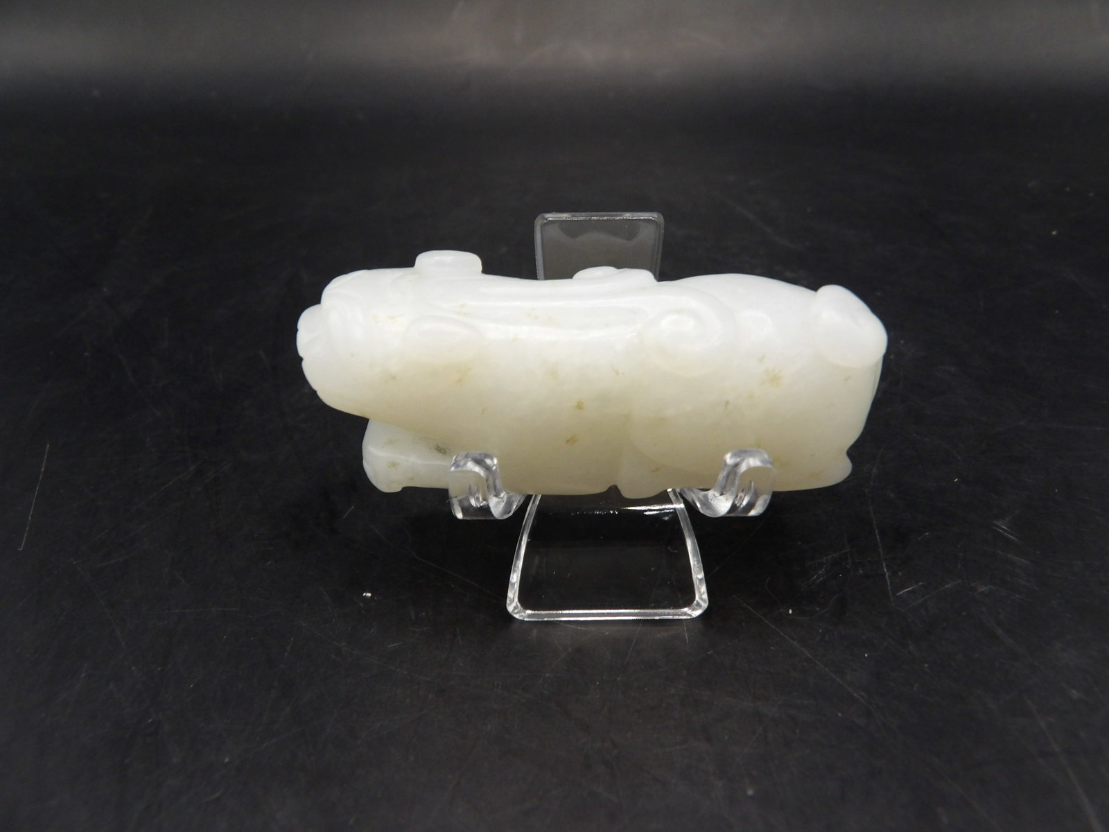Chinese white jade beast carving: 2.2 inches length. 34 grams. We will inhouse ship items to you very affordable and efficient. Select self-arrange shipping.