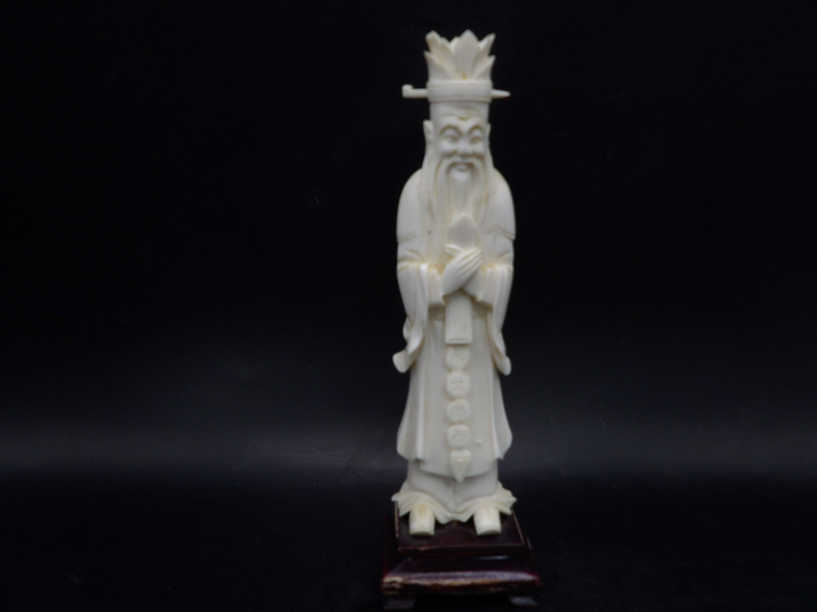 Very fine carved natural material antique Chinese scholar figurine - No Export: Chinese calligraphy on figurine's robe. Figurine is adhered to wooden base and total height is 7 inches. No Export. We will inhouse ship items to you very affordable and efficient. Select self-arrange