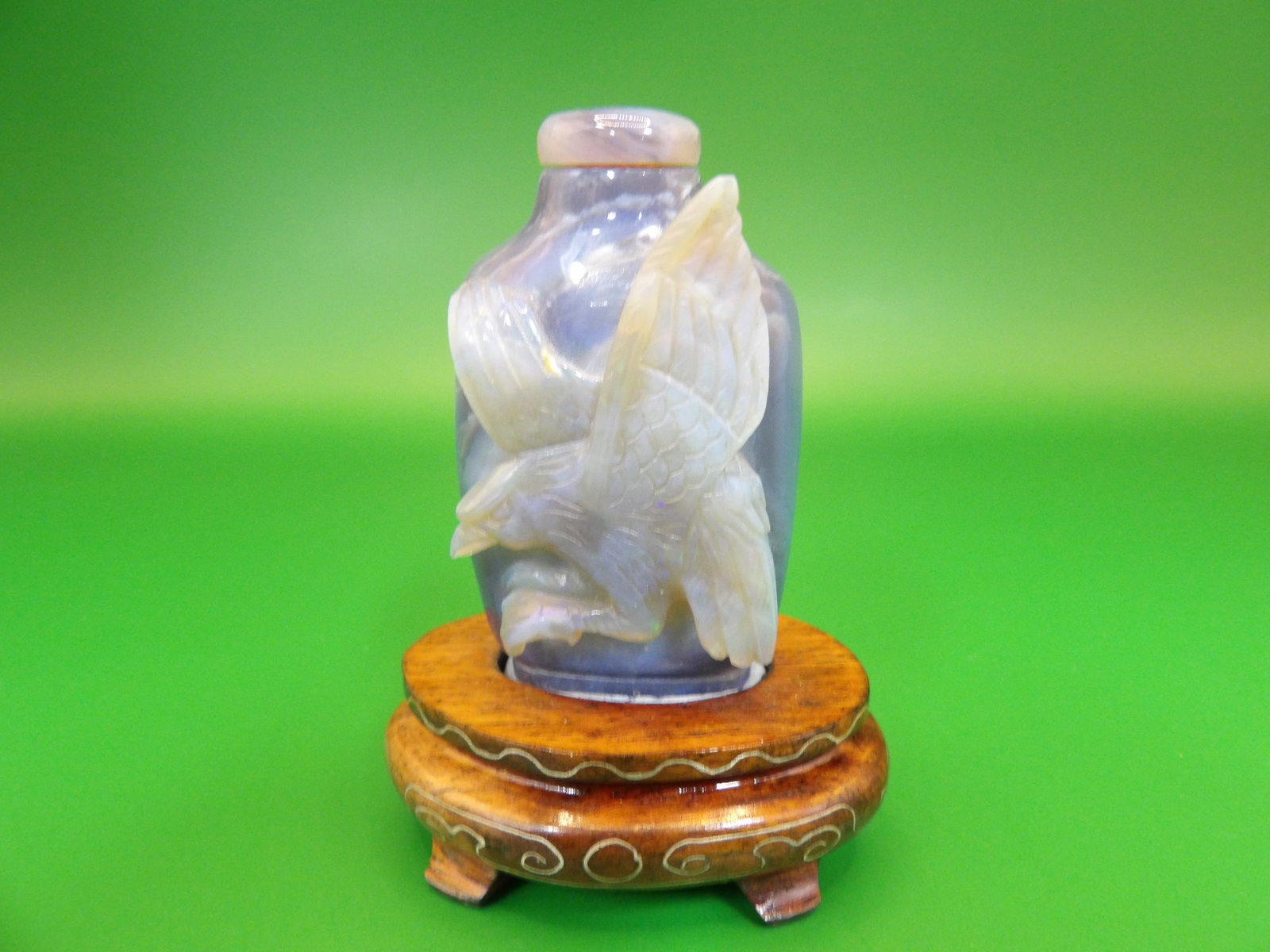 fine carved opal snuff bottle with raised Eagle motif and custom wood base: 2.8 inches height.