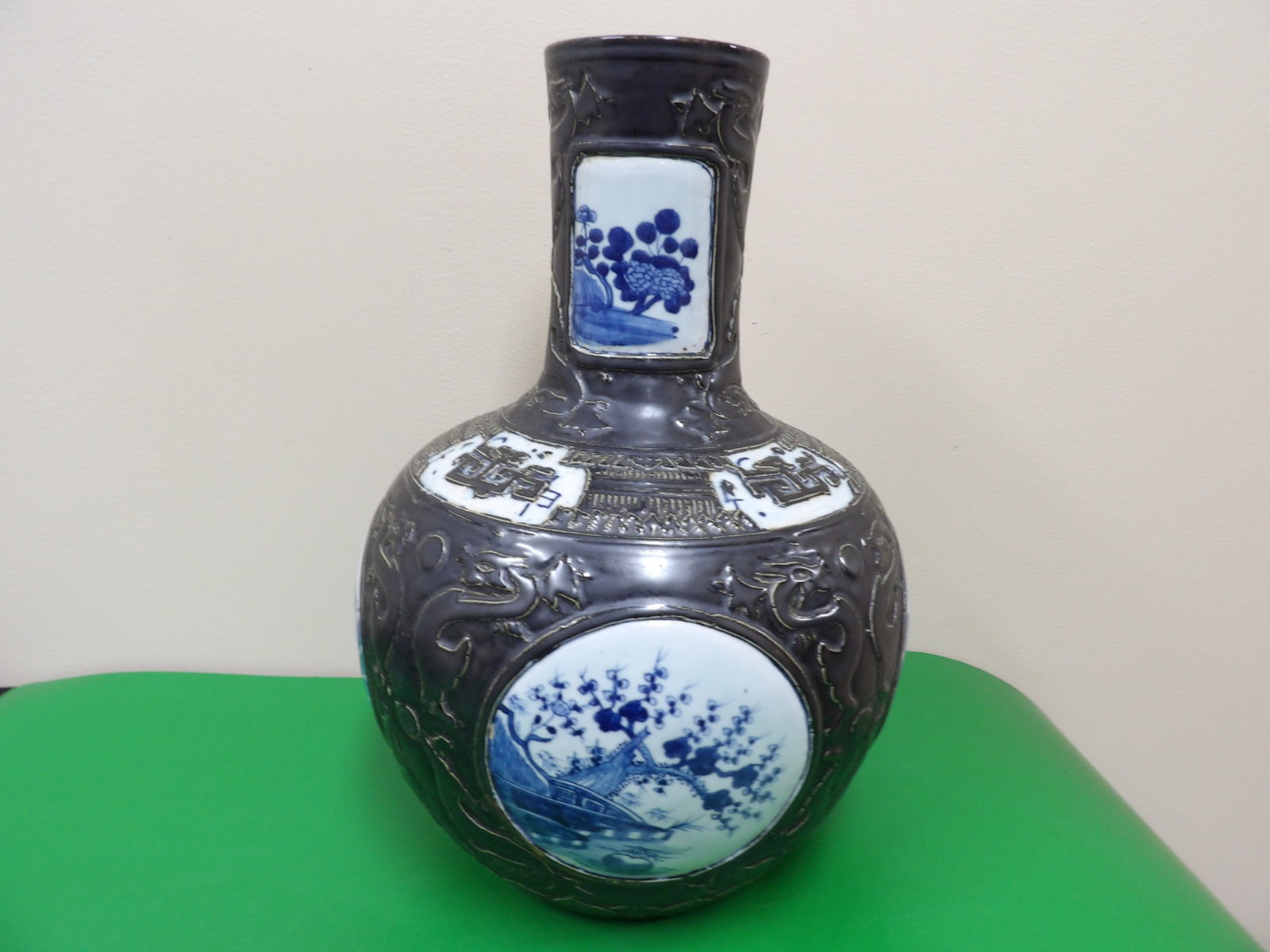 antique Chinese porcelain vase with blue and white hand painted panels: 15 inches height.