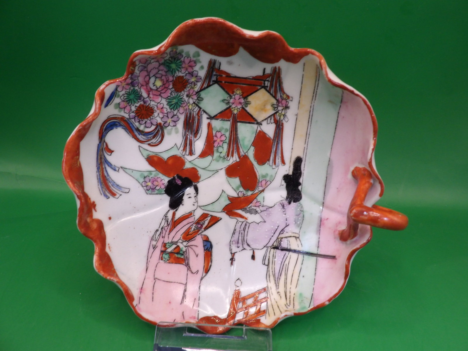 antique Japanese hand painted porcelain dish with geisha and floral motifs: 6.5 inches length.