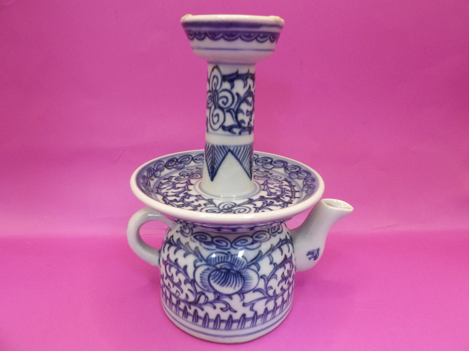 antique Chinese blue and white porcelain oil lamp with floral motif: 6.5 inches height.