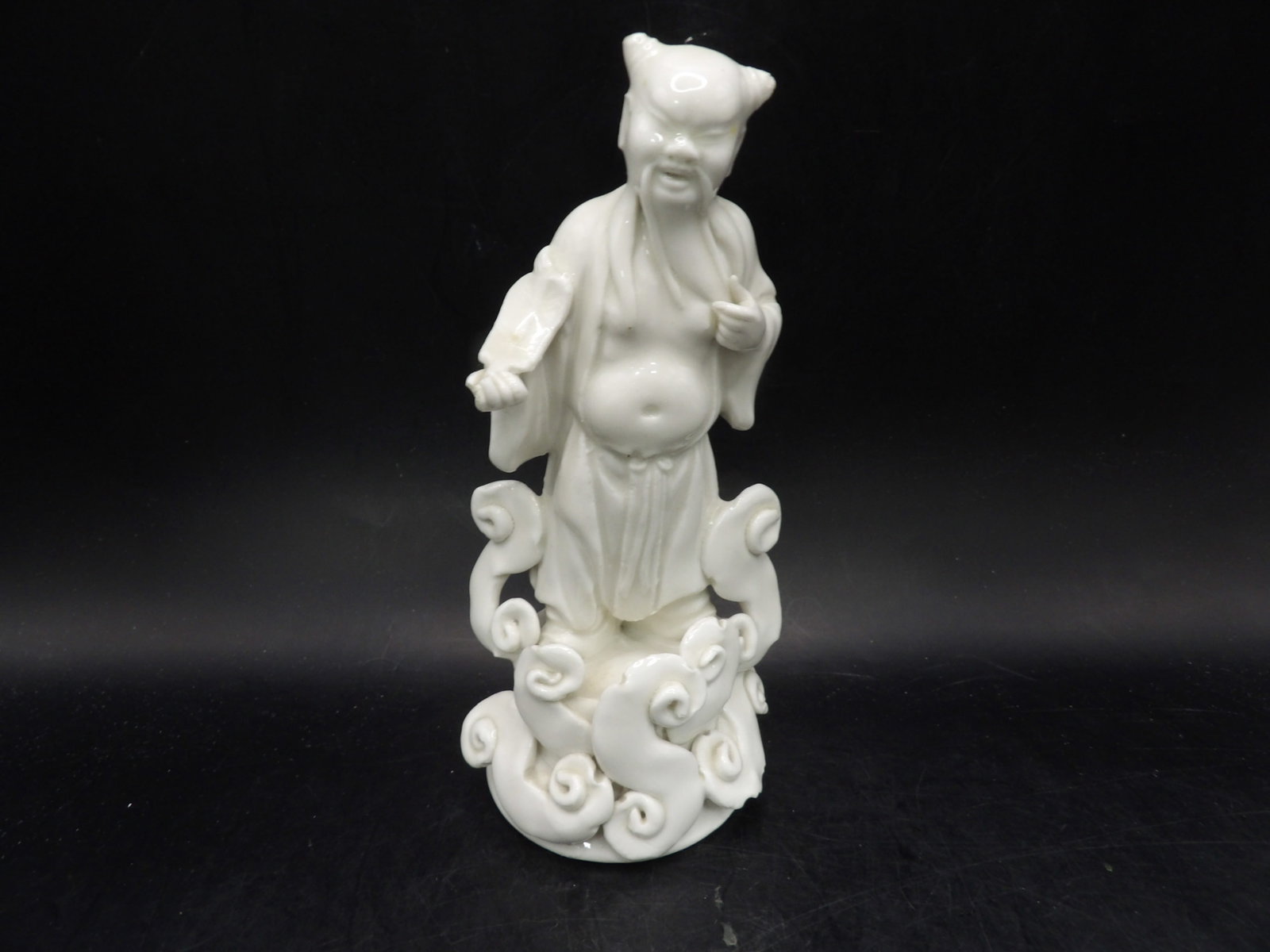 Chinese Dehua porcelain immortal figurine standing on clouds: 6.5 inches height. We will inhouse ship items to you very affordable and efficient. Select self-arrange shipping.