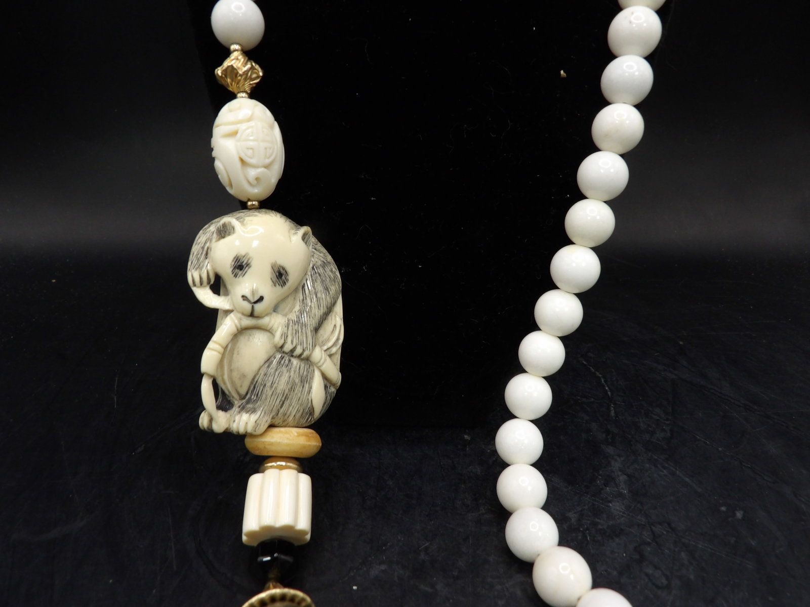 35 inches long fine carved Panda beaded necklace: Penda is 2 inches height. No international shipping for this item. We will inhouse ship items to you very affordable and efficient. Select self-arrange shipping.