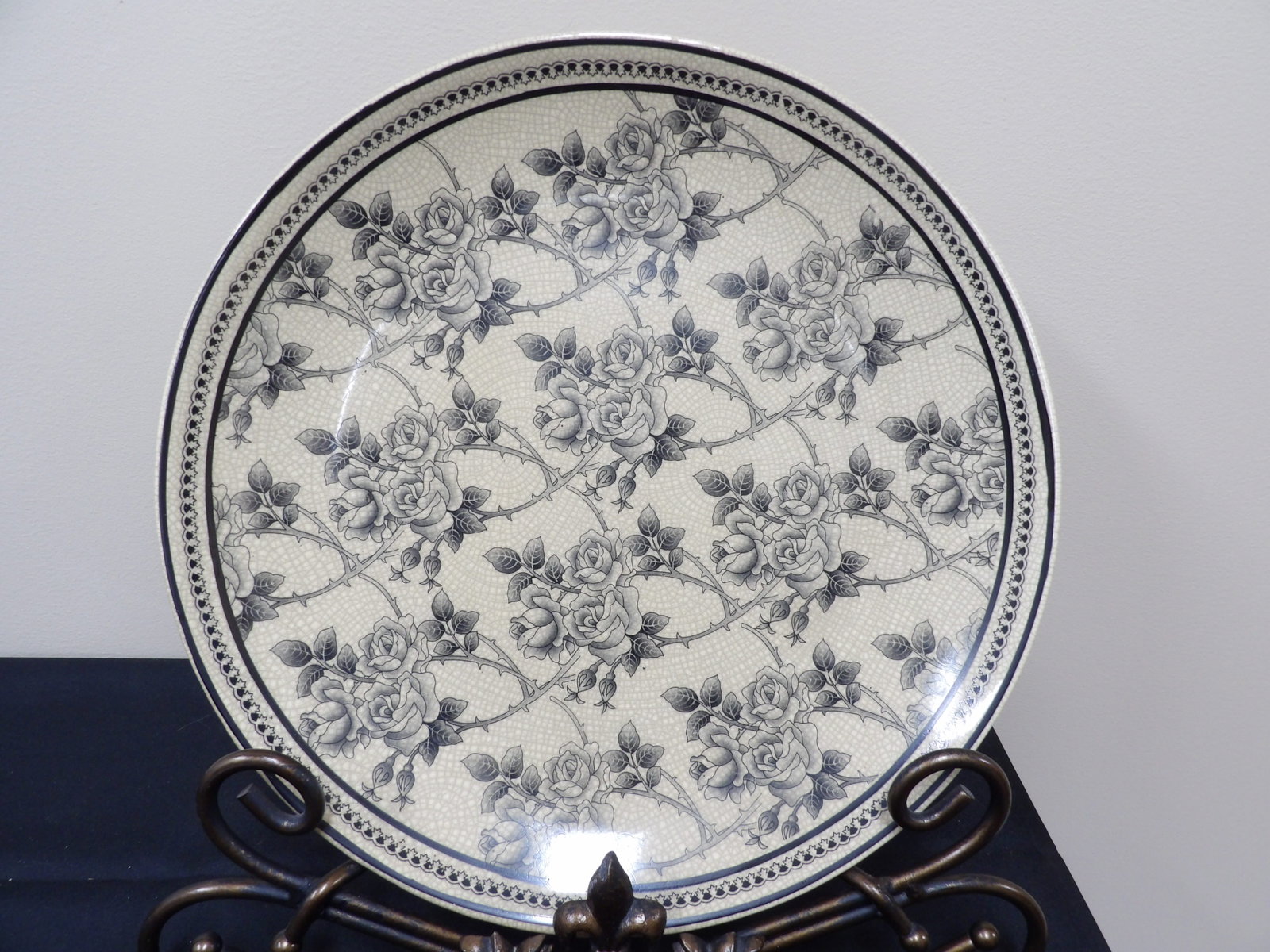 black floral transferware plate with crackle glaze: 14.4 inches diameter. Metal display base is not included. We will inhouse ship items to you very affordable and efficient. Select self-arrange shipping.