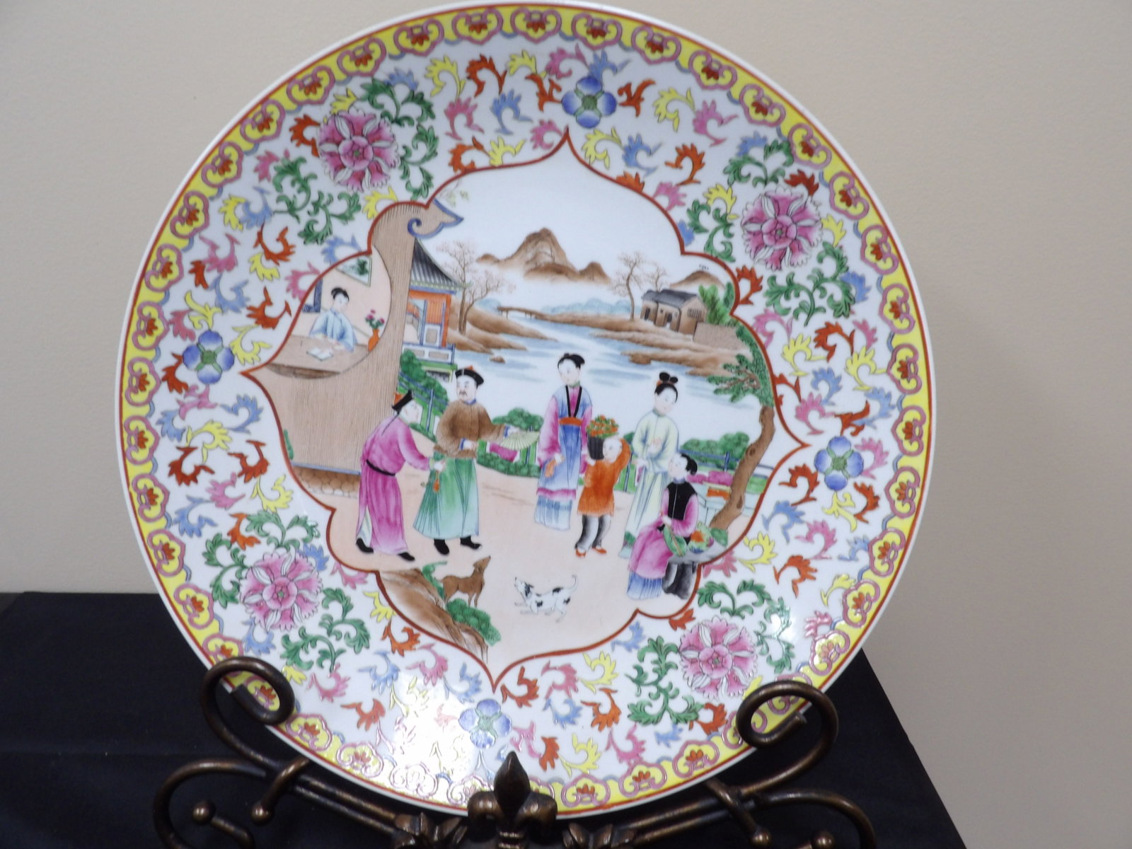 large Chinese famille rose charger plate with Qing dynasty Qianlong mark and figural landscape: 16.2 inches diameter. Metal display base is not included. Vibrant colors. We will inhouse ship items to you very affordable and efficient. Select self-arrange shipping.