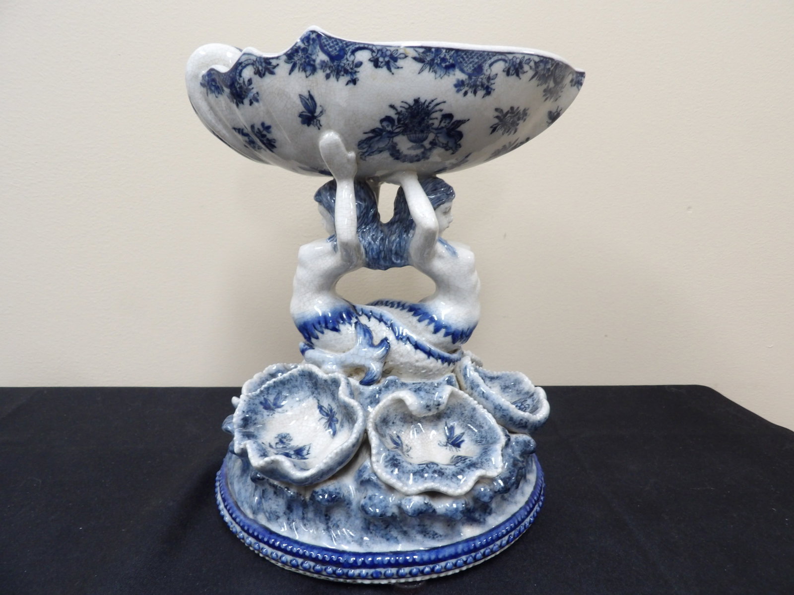 Chinese export blue and white crackle porcelain mermaid figural compote: 10.3 inches height.