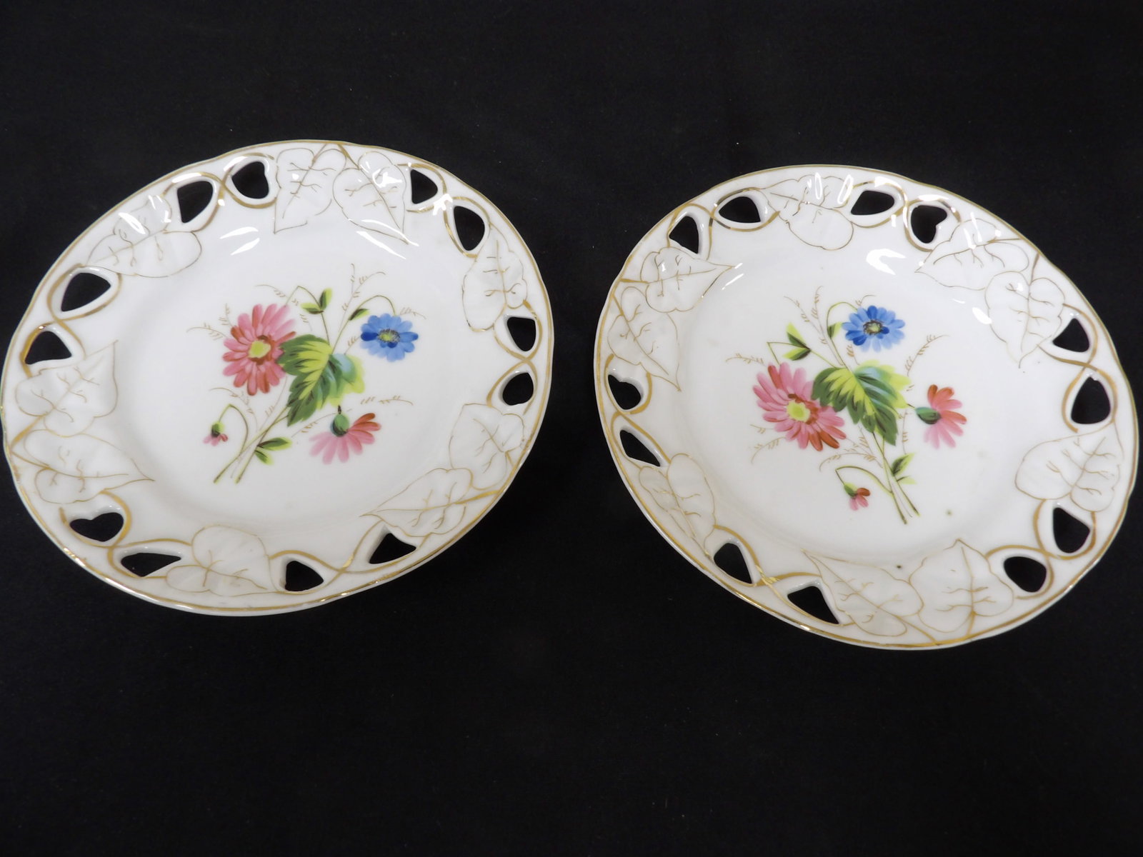 pair of antique German hand painted porcelain plates with floral motif and gold gilt: 7.8 inches diameter. Unsigned. We will inhouse ship items to you very affordable and efficient. Select self-arrange shipping.