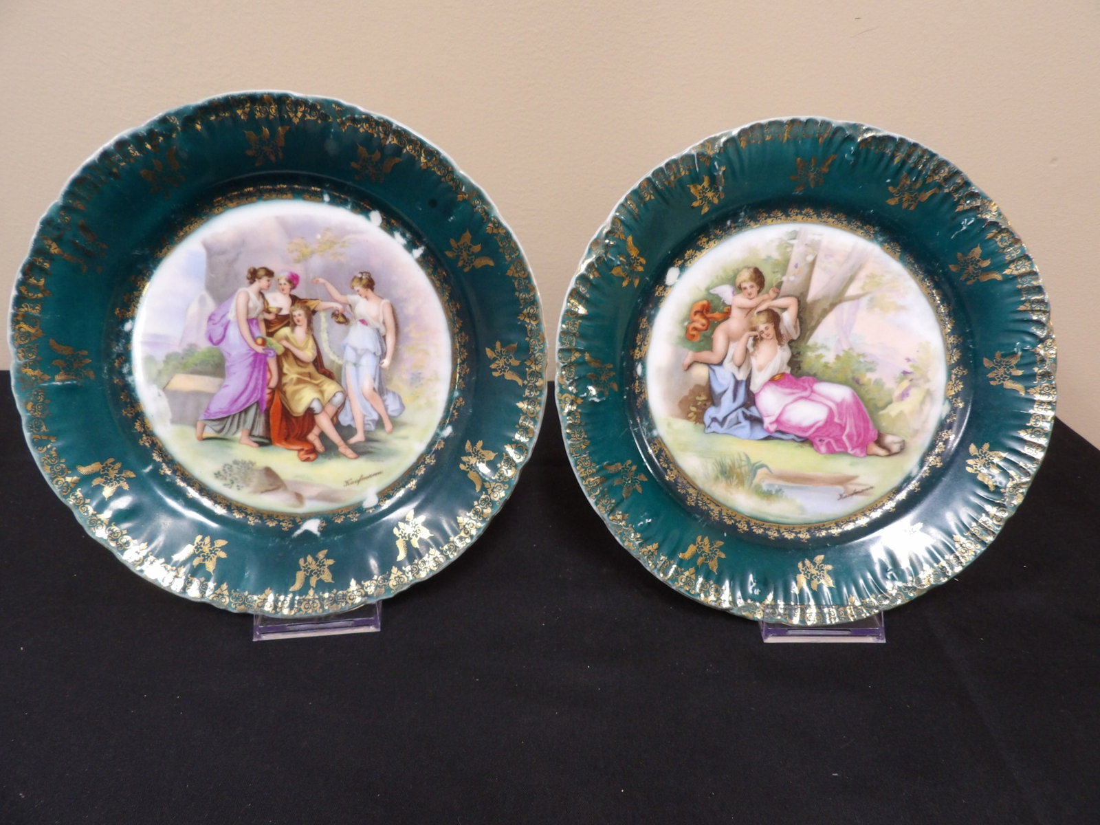 19th century Austria pair of Victoria Carlsbad porcelain plates with classical scenes by Kaufmann: 9.5 inches diameter.