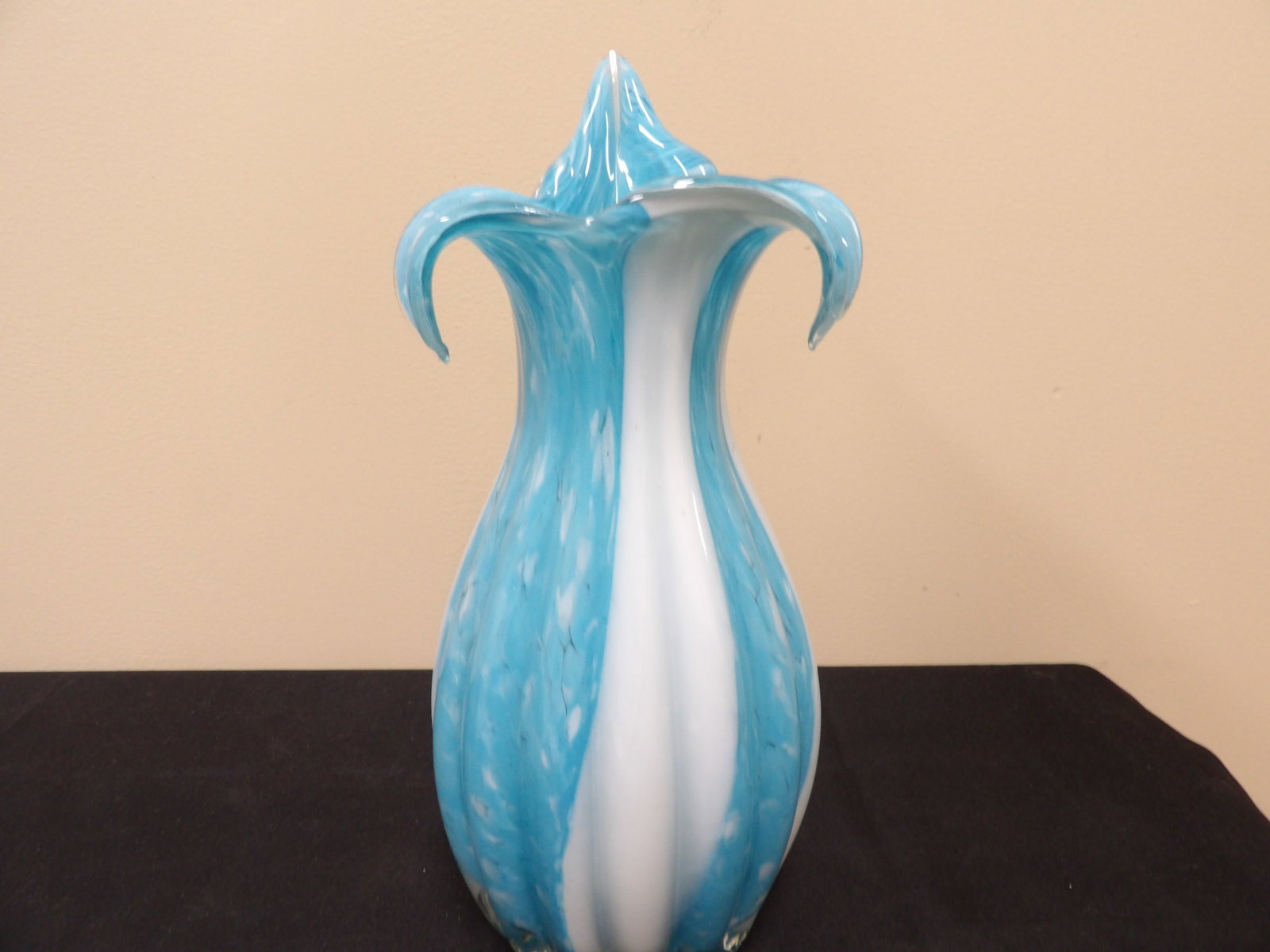 Murano-style art glass vase with blue and white swirls: 12 inches height.