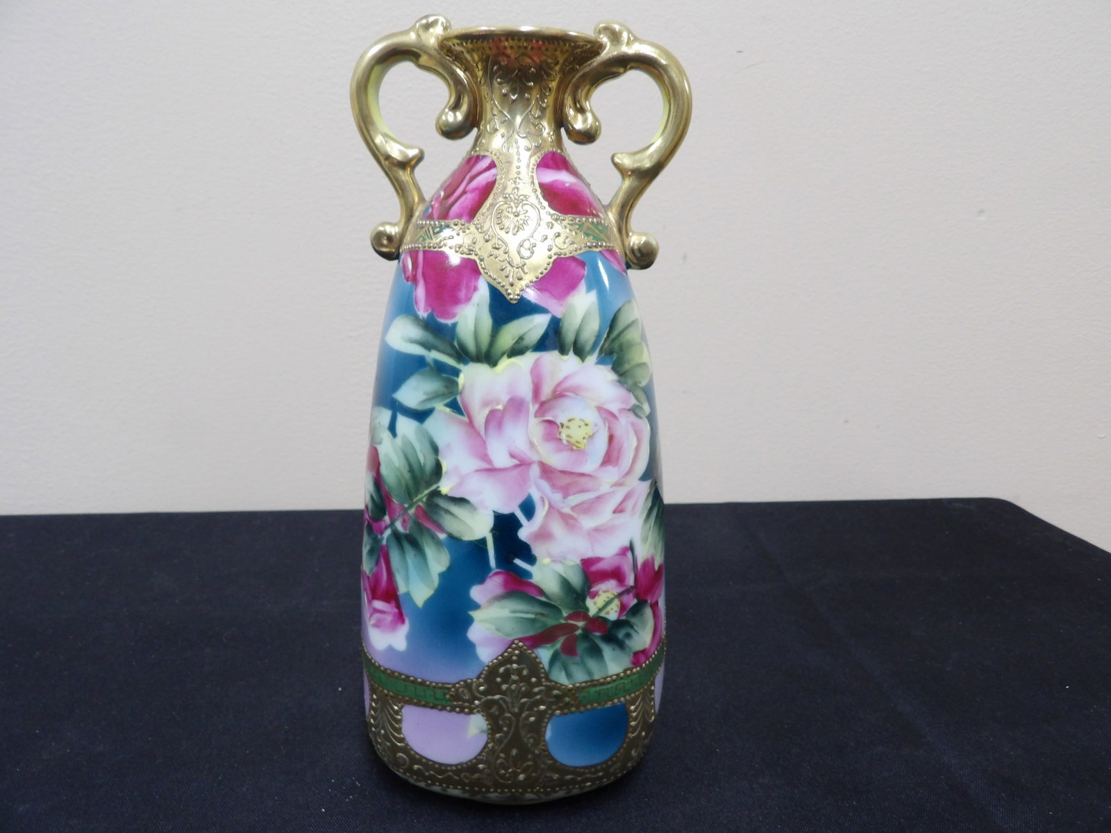 ornate antique Nippon hand painted porcelain vase with moriage and gold accents: 8.3 inches height.
