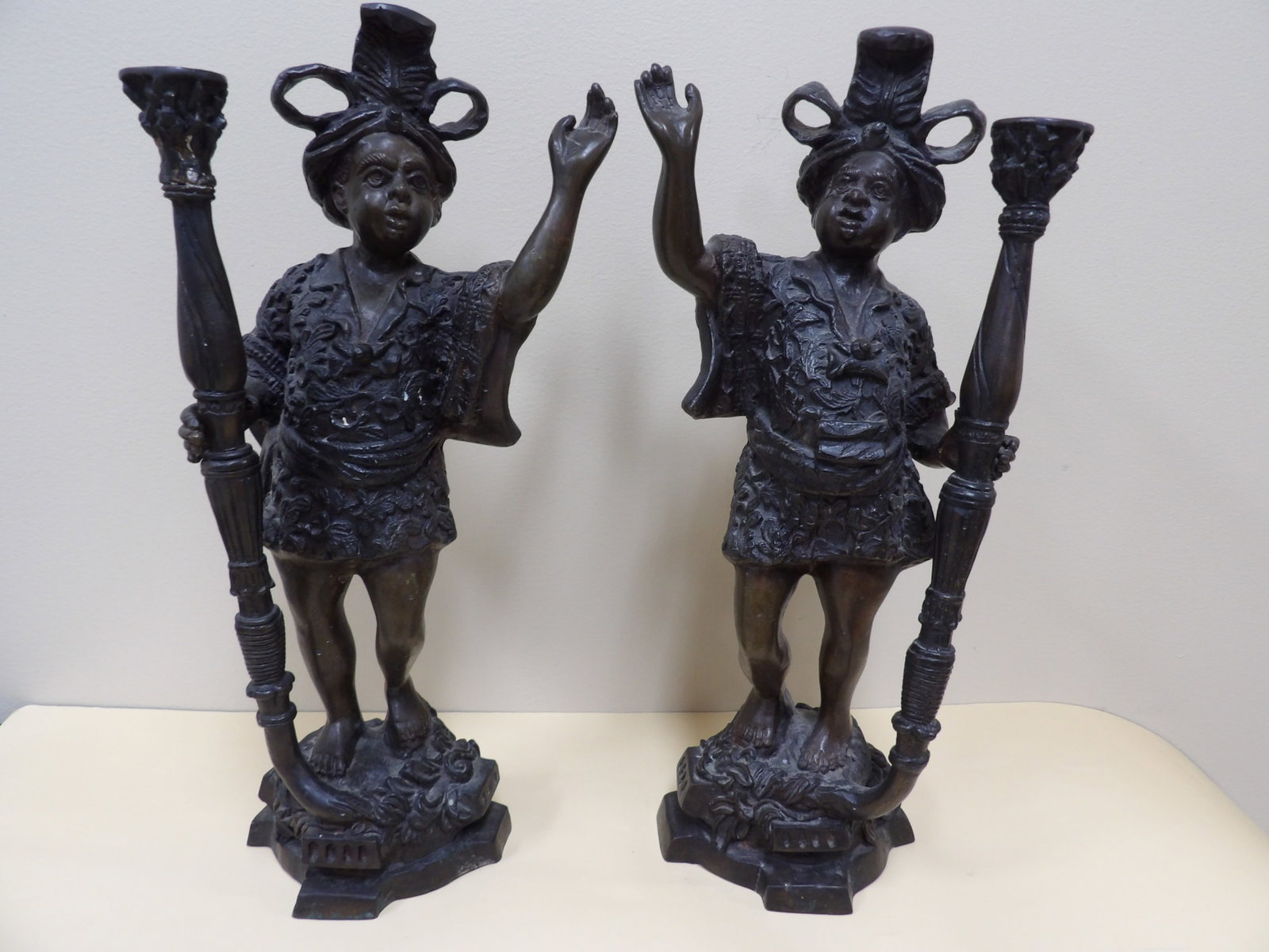 pair of bronze Blackamoor candlesticks with torch-like candle holders (1 of 8)