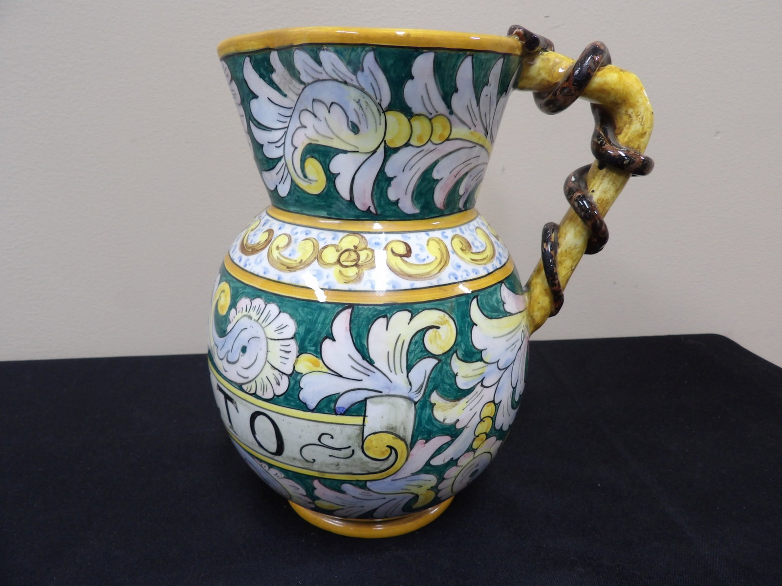 Italian ceramic pitcher with snake handles marked BELVI MOLTO: 8.5 inches height.