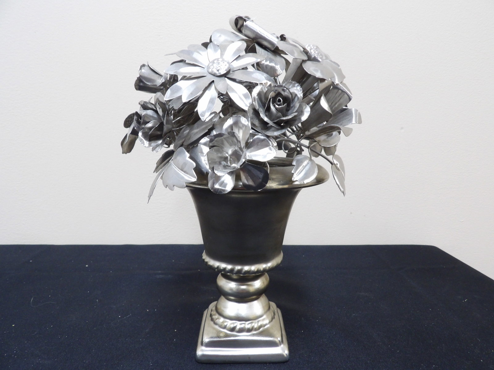 decorative metal flower bouquet in a urn-shaped vase: 9.2 inches height. We will inhouse ship items to you very affordable and efficient. Select self-arrange shipping.