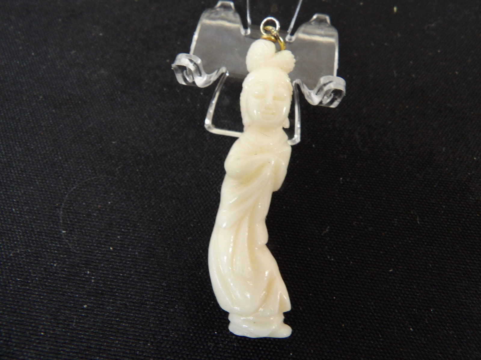 Chinese angel skin coral carved Kwan Yin figural pendant: 2 inches height not including pendant bail. We will inhouse ship items to you very affordable and efficient. Select self-arrange shipping.