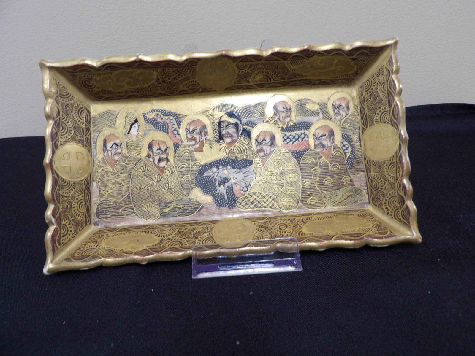 rare antique Japanese Satsuma the "Thousand Immortals" motif porcelain dish tray: 8.2 inches length. Bottom has old price tag of 275. We will inhouse ship items to you very affordable and efficient. Select self-arrange shipping.