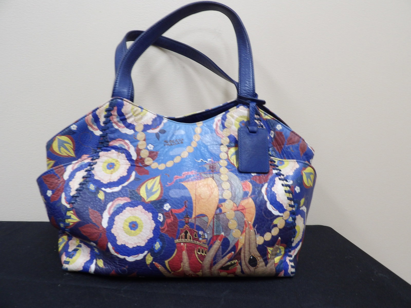 Icon of Los Angeles Alberto Vargas painted leather shoulder bag with floral and ship motifs: Very good condition. Approx size is 15 x 10 x 7 inches. 2 zipper pockets, 2 compartments plus small pockets.