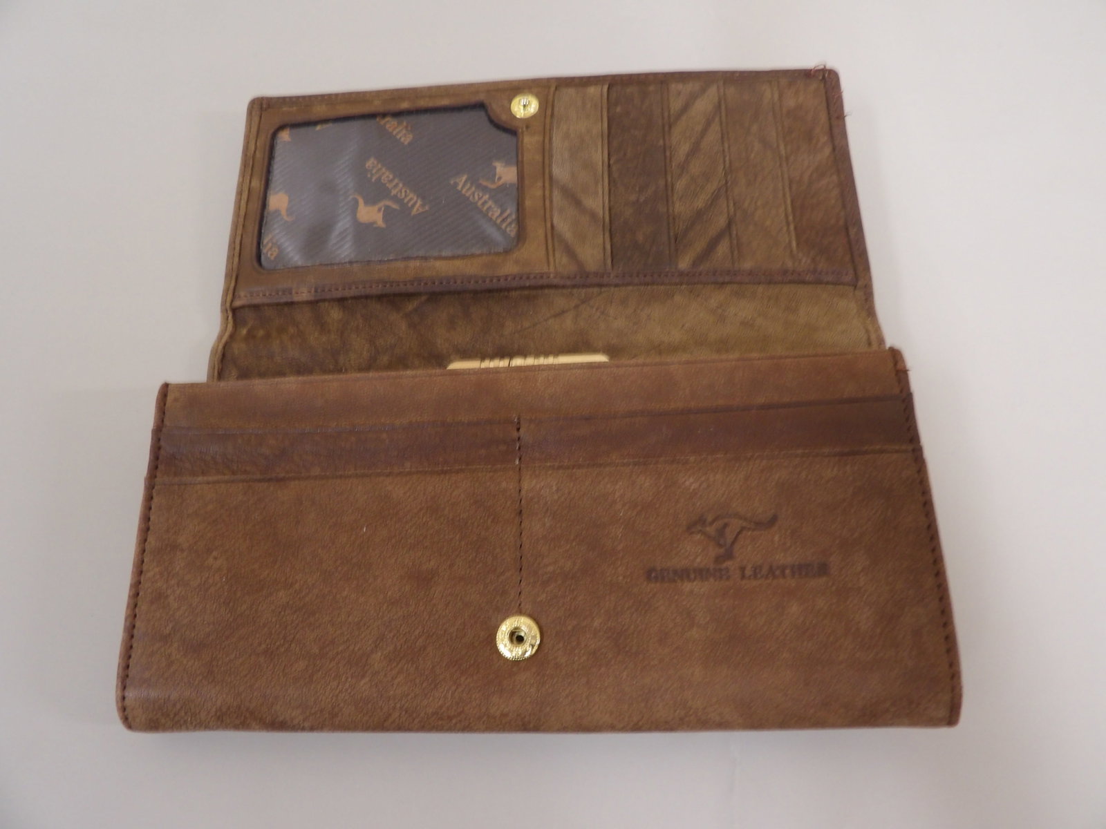 Australian genuine leather wallet with kangaroo motif: Size is 7 x 3.4 x 0.8 inches with multiple slots.