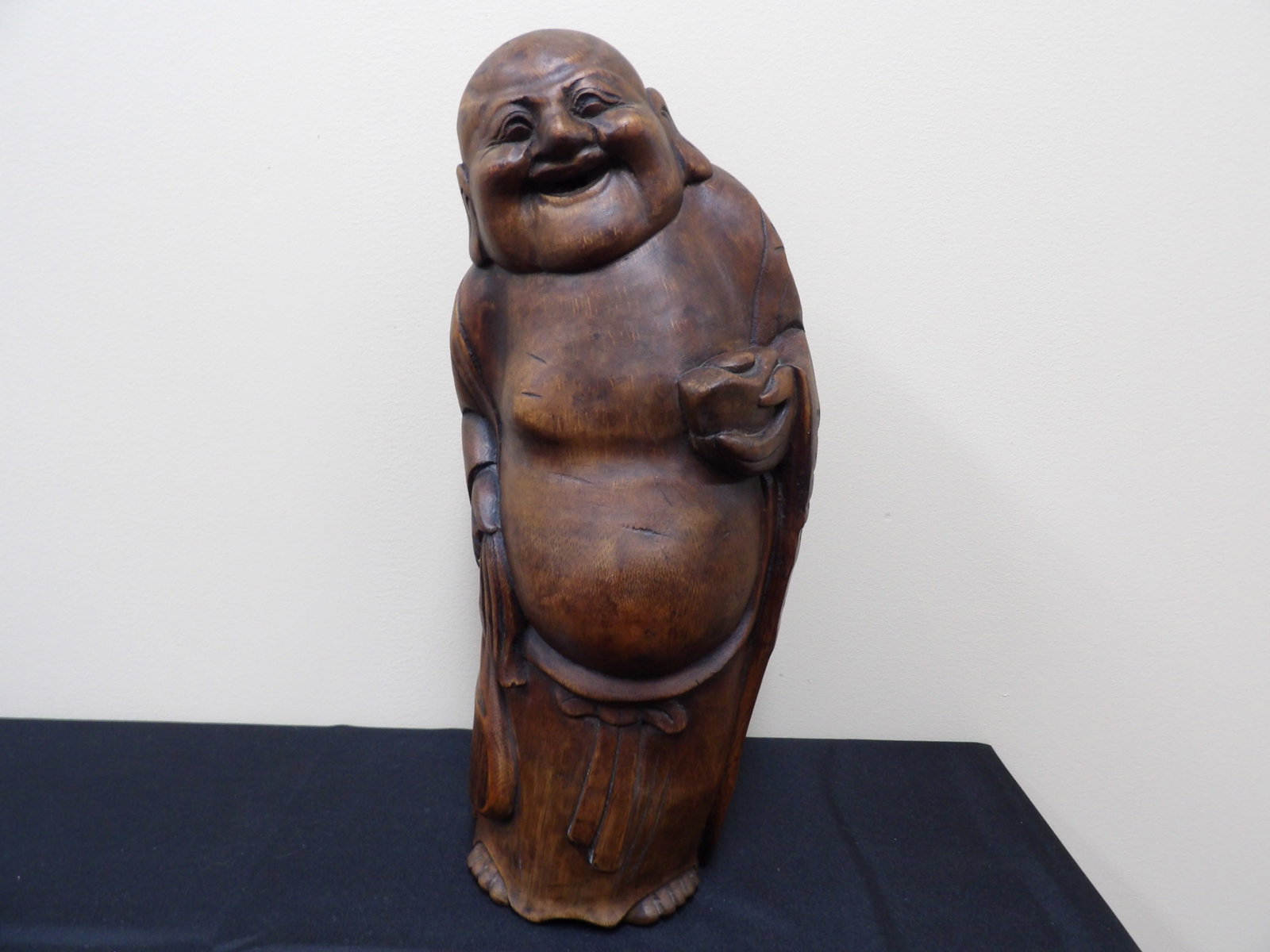 large Chinese bamboo carved laughing buddha holding ingot statue: Approx. 17 inches height. We will inhouse ship items to you very affordable and efficient. Select self-arrange shipping.