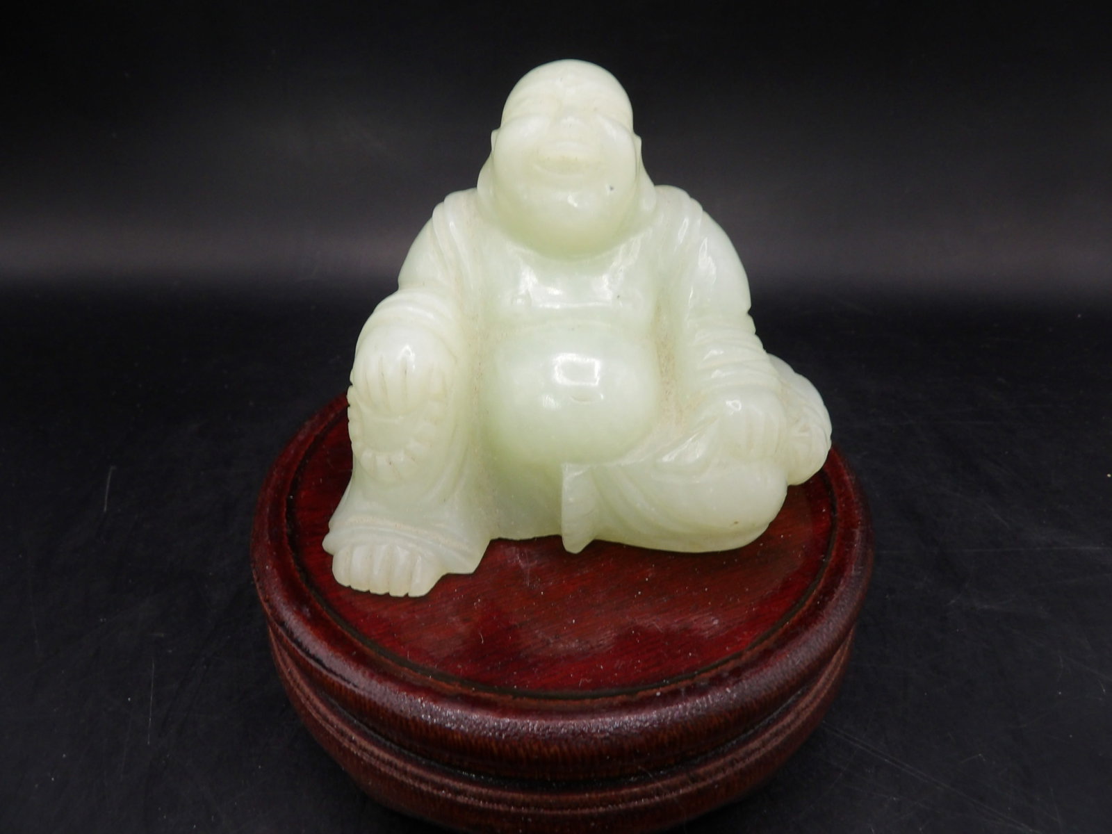 Chinese jade carved buddha statue on wooden base: 3.3 inches length. 273 grams. We will inhouse ship items to you very affordable and efficient. Select self-arrange shipping.