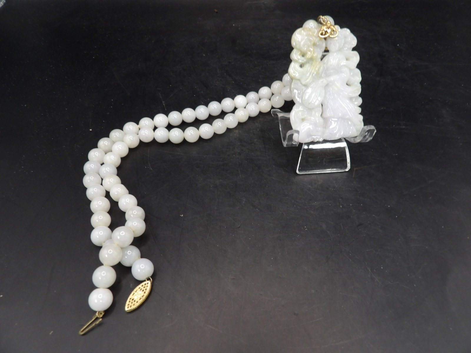 Stamped 14k Chinese jadeite jade necklace with large carved pendant: Clasp is stamped 14k. Pendant is over 2 inches height. 20 inches beaded necklace. Total weight is 108 grams. We will inhouse ship items to you very affordable and efficient. Select self-arrange shippi
