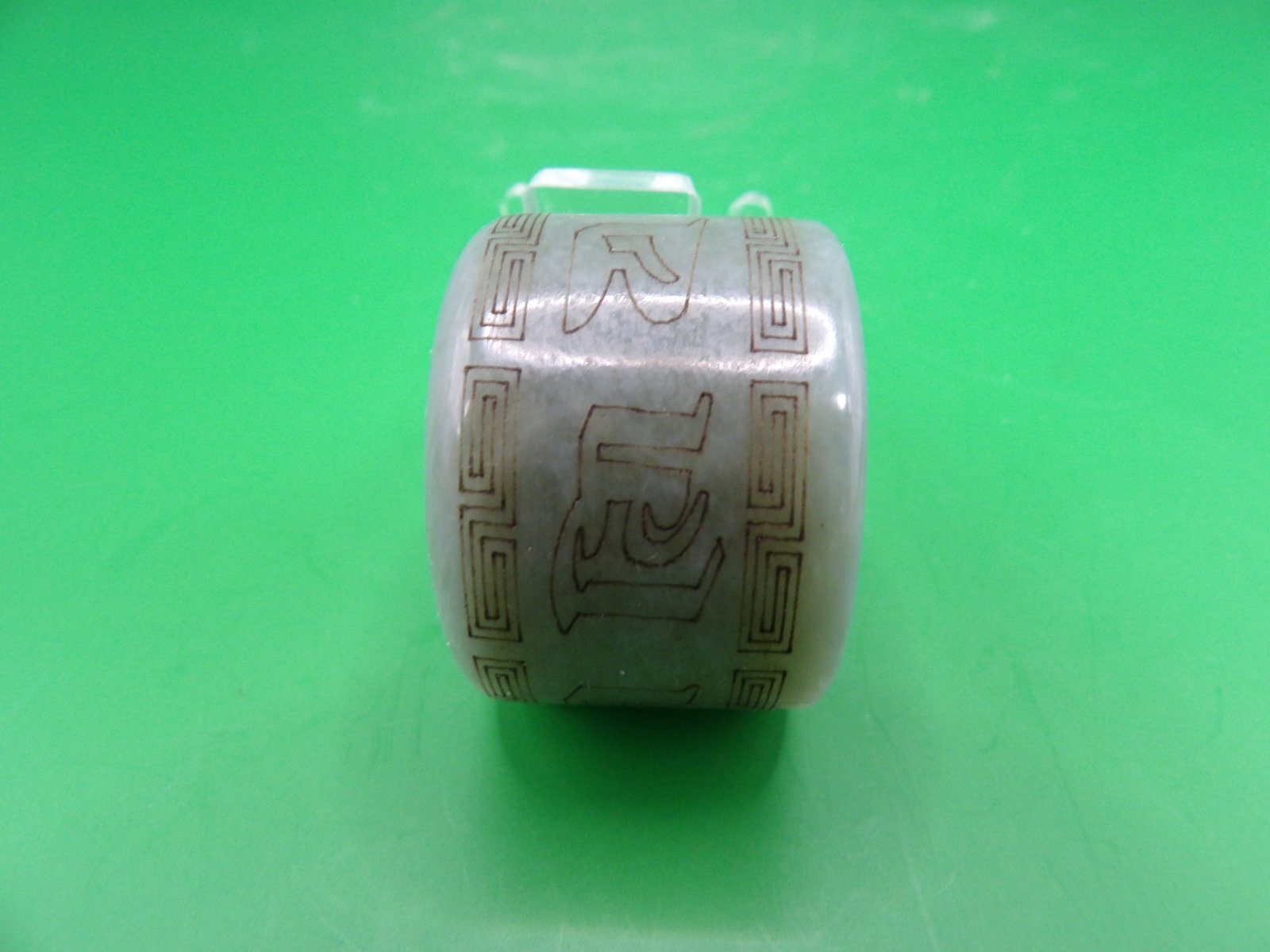 Chinese carved jade archer's ring: 1 inches height. 40 grams. We will inhouse ship items to you very affordable and efficient. Select self-arrange shipping.