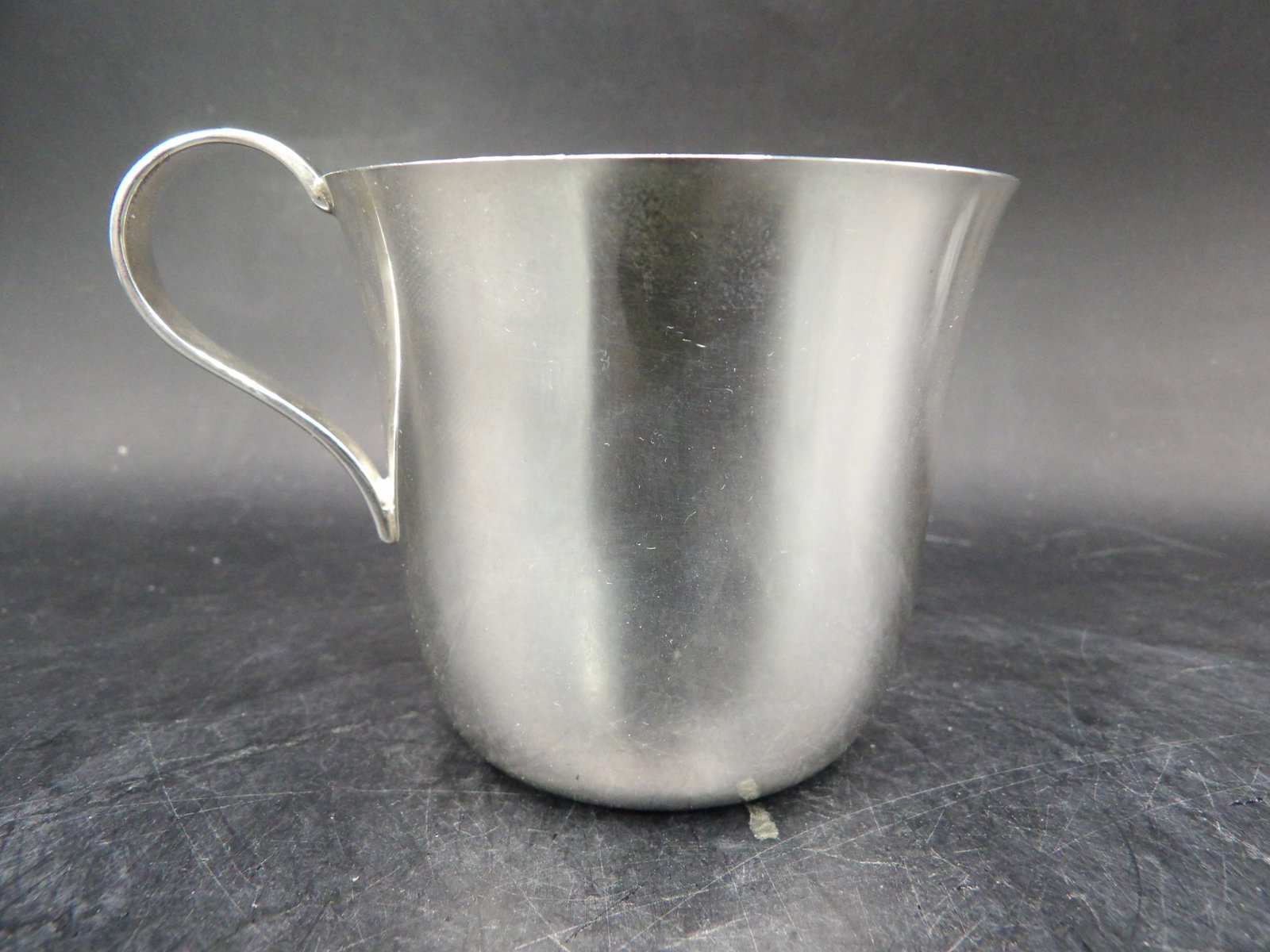 Tiffany & Co sterling silver baby cup 88 grams: Marked Tiffany & Co Sterling on the bottom. On side is engraved a baby name and DOB. We will inhouse ship items to you very affordable and efficient. Select self-arrange shipping.