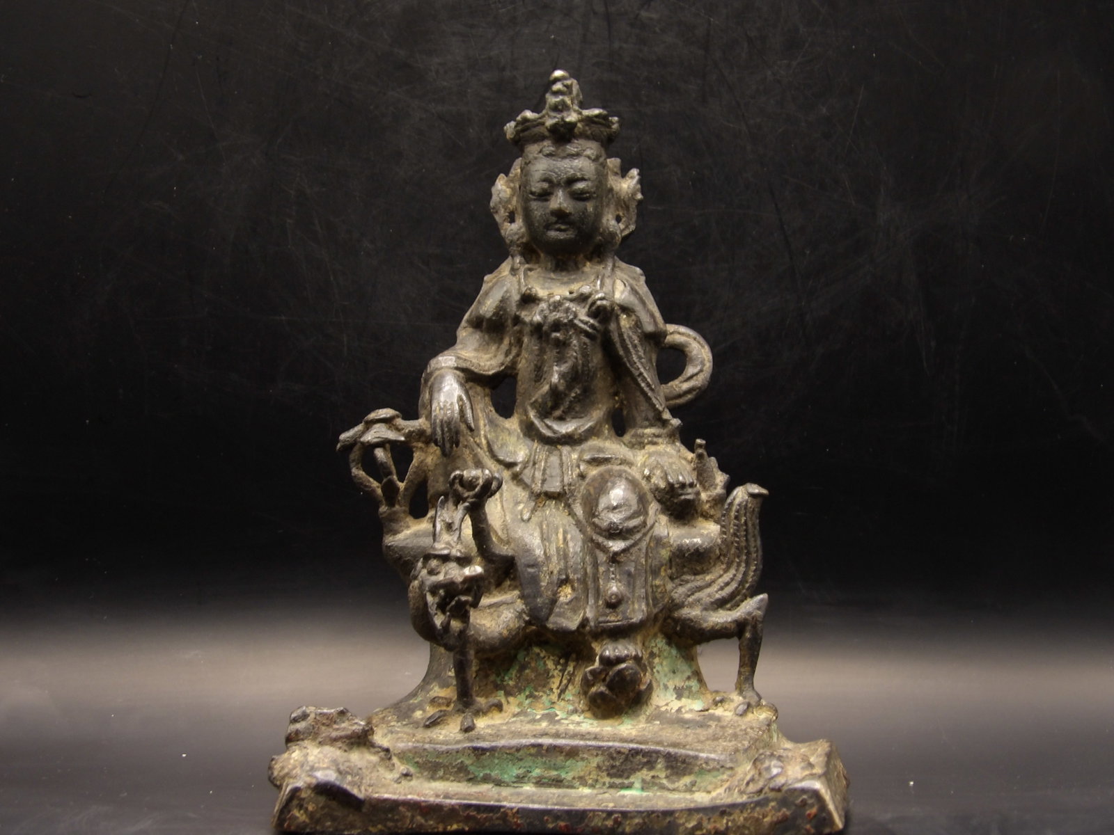 Rare Ming Dynasty Chinese Bronze Buddha Riding A Dragon: RARE FIND! 6.5 x 5 x 3.5 inches. Some gold gilt remaining.Item was well cared for in display case. Prominent collector southeastern USA. We will inhouse ship items to you very affordable and efficient