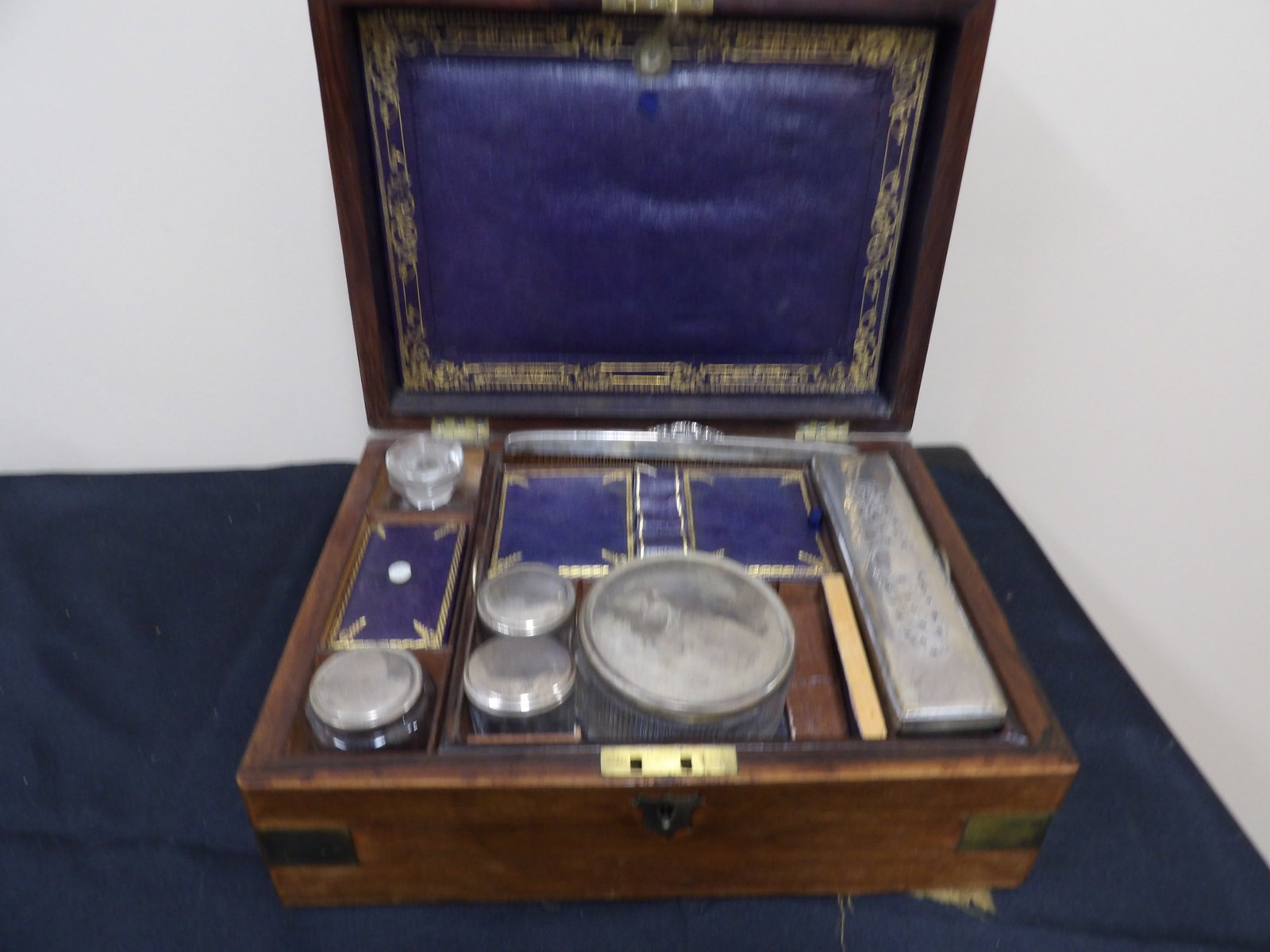 rare antique English wood and brass inlaid traveling toilet kit with various grooming accessories: Box size is 12 x 8.8 x 5.2 inches. Believed to be from early 1800s. We will inhouse ship items to you very affordable and efficient. Select self-arrange shipping.