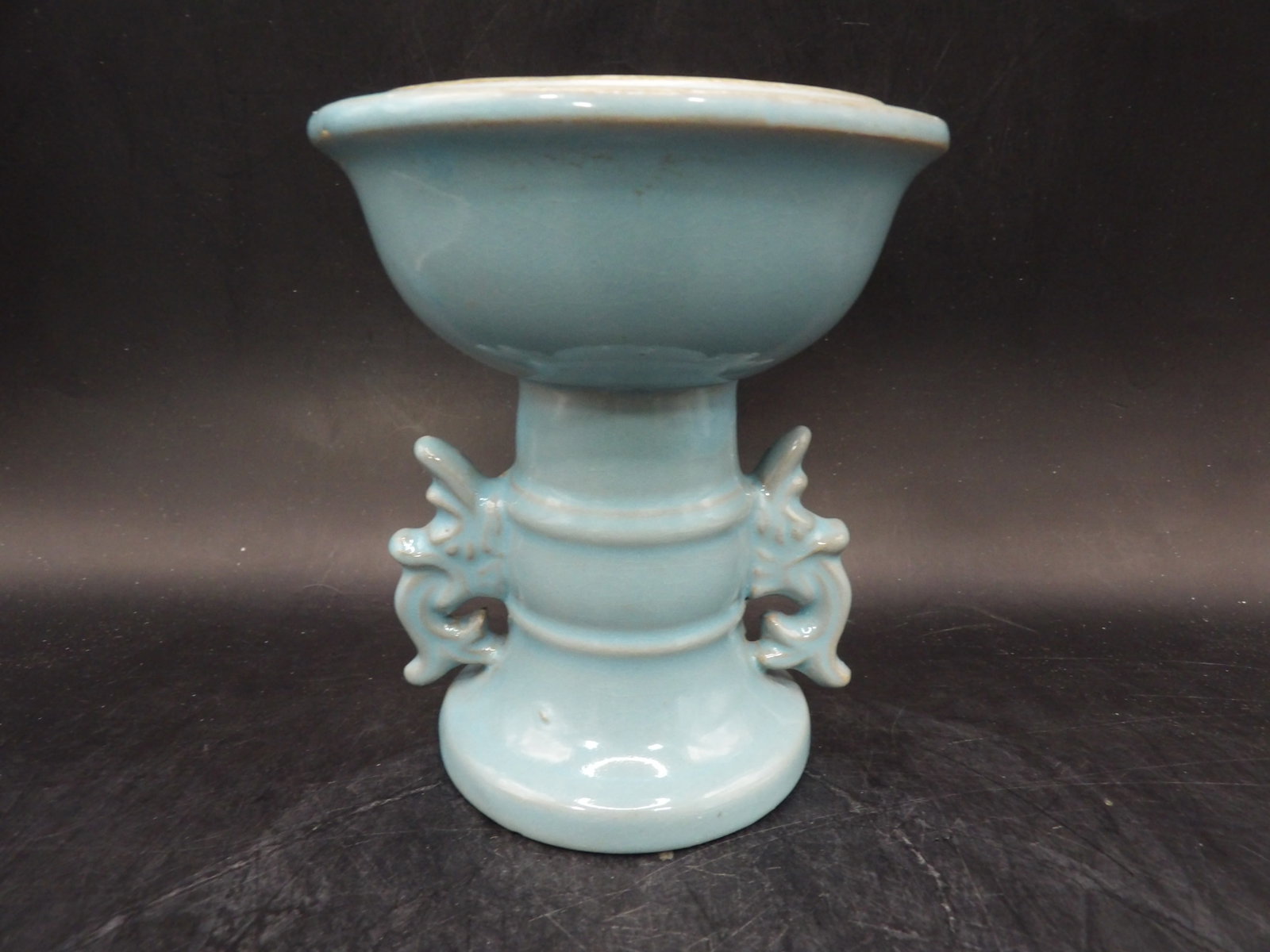 Chinese porcelain vessel with dragon handles probably incense burner: Approx. 5 inches height.