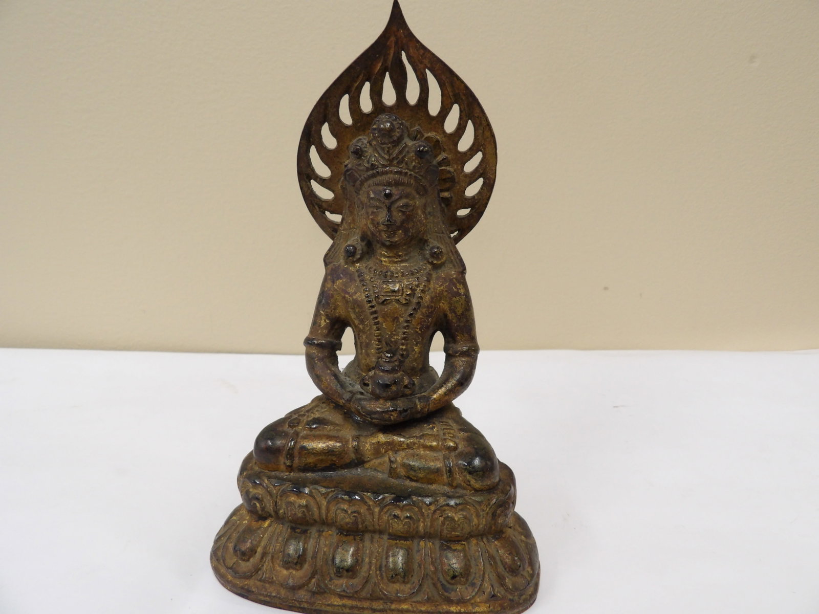 antique Chinese or Japanese gilt bronze seated buddha figurine with flame halo and lotus base: 6.3 inches height. We will inhouse ship items to you very affordable and efficient. Select self-arrange shipping.