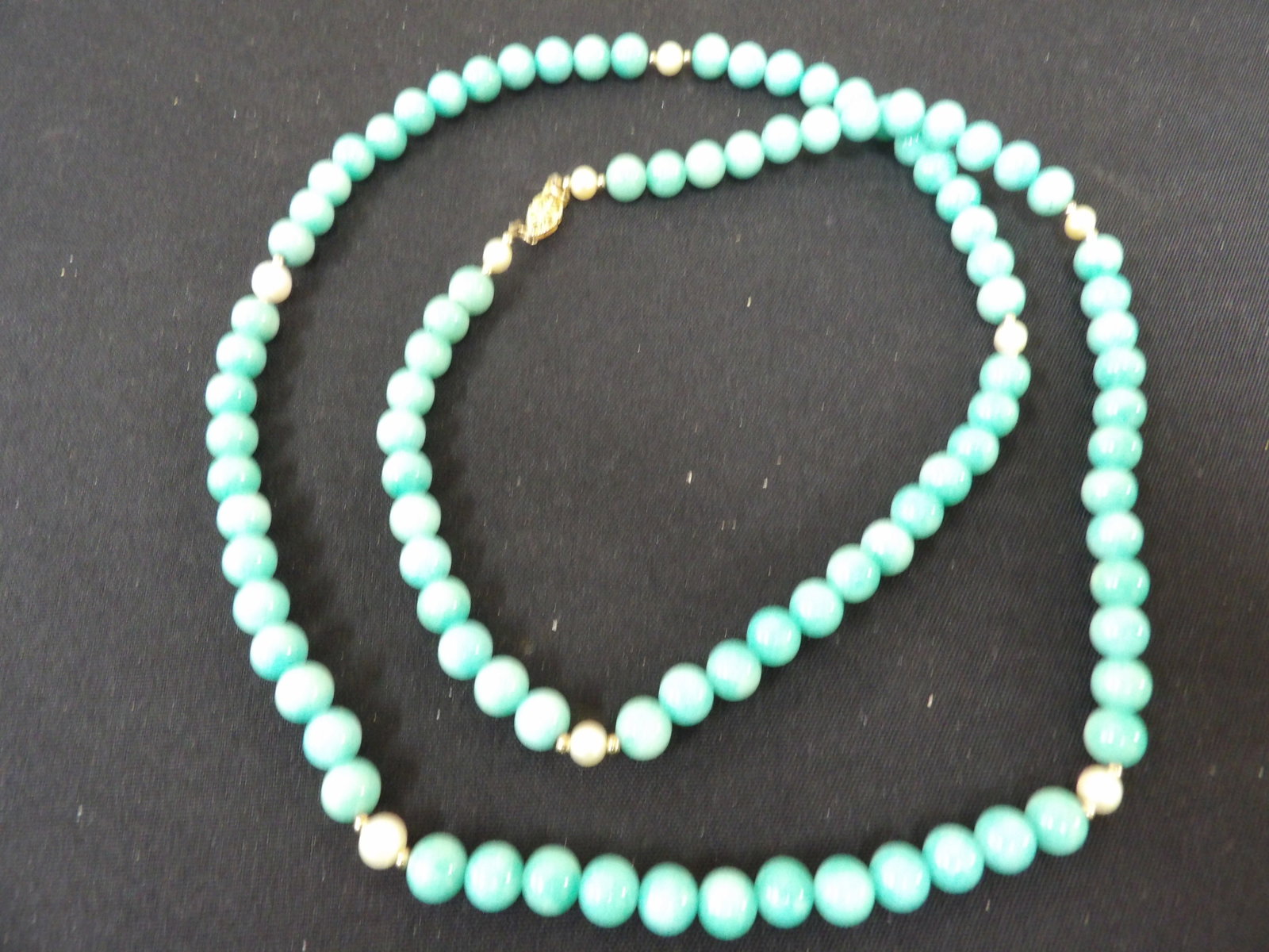 34 inches long 14k gold clasp and small gold beads jadeite? beaded necklace: Marked 14k on the clasp. Small gold color beads were tested as 14k. Bluish green beads were tested as jadeite on gem tester. We will inhouse ship items to you very affordable and efficient. Select sel