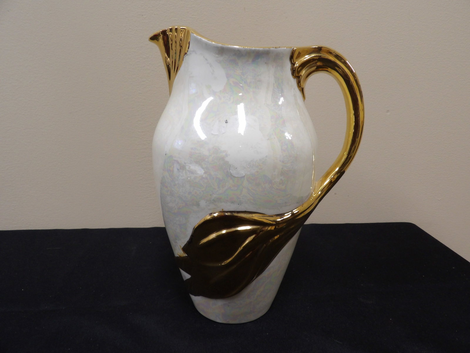 Art Nouveau style pearlescent pitcher with gold leaf decoration: Approx. 10 inches height. Not signed. We will inhouse ship items to you very affordable and efficient. Select self-arrange shipping.