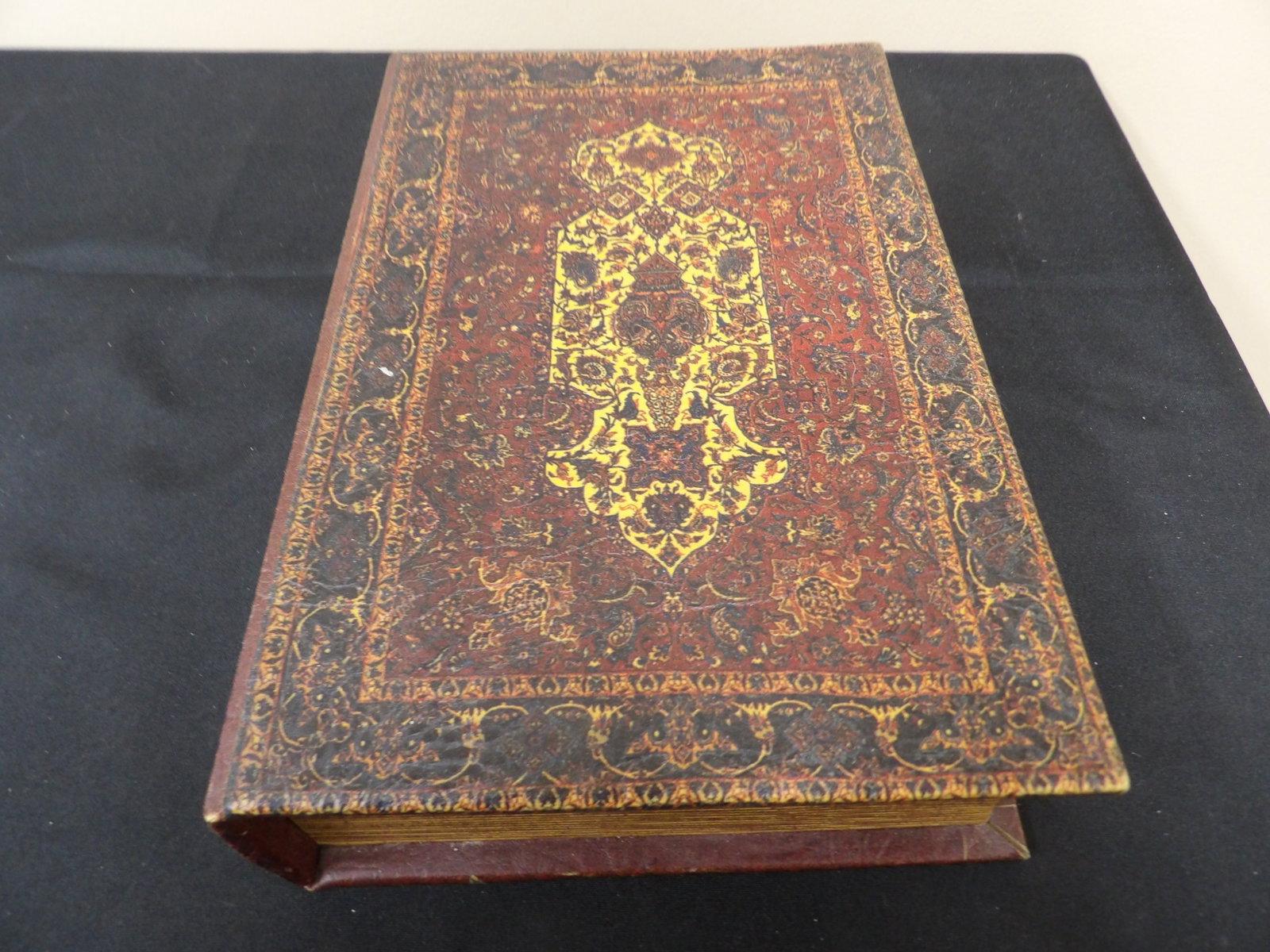 decorative book box with Persian rug inspired design: Approx size is 8 x 12 x 3 inches. We will inhouse ship items to you very affordable and efficient. Select self-arrange shipping.