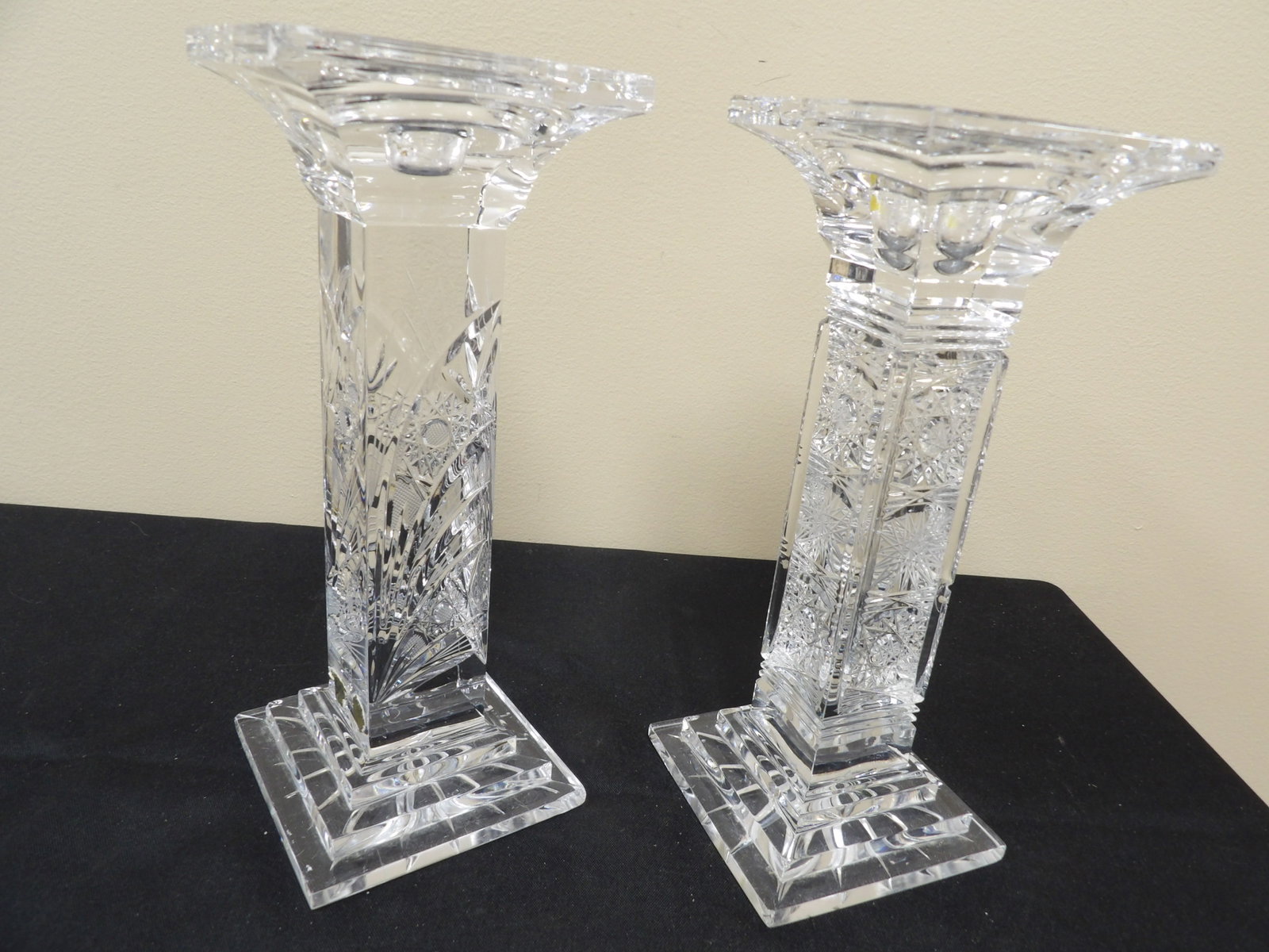 lot of 2 cut Bohemian crystal candlesticks with square bases and platforms: 9 inches height. The designs of the 2 candle holders are different. We will inhouse ship items to you very affordable and efficient. Select self-arrange shipping.