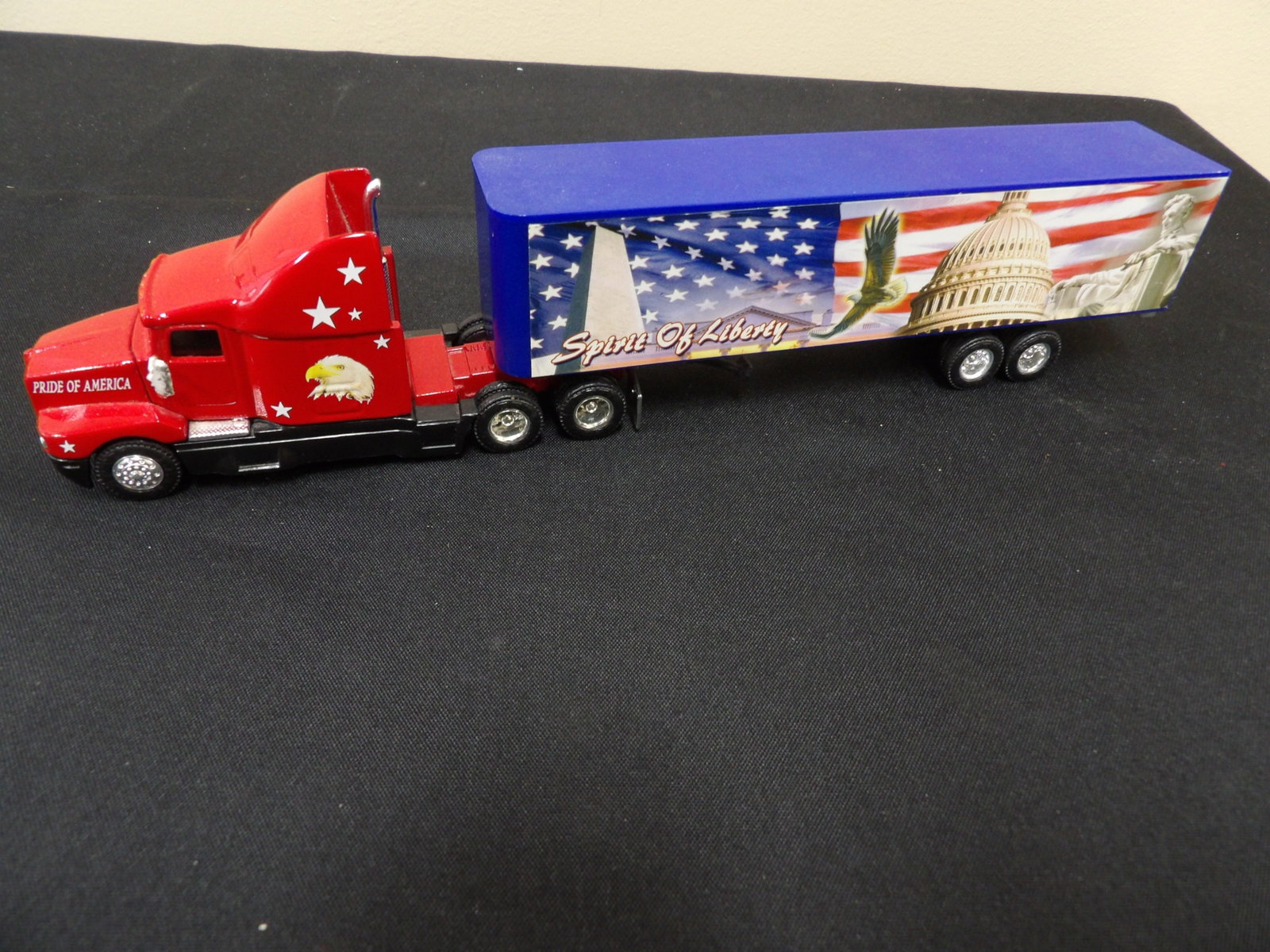 ERTL Spirit of Liberty patriotic semi-trailer truck: 11.4 inches length. We will inhouse ship items to you very affordable and efficient. Select self-arrange shipping.